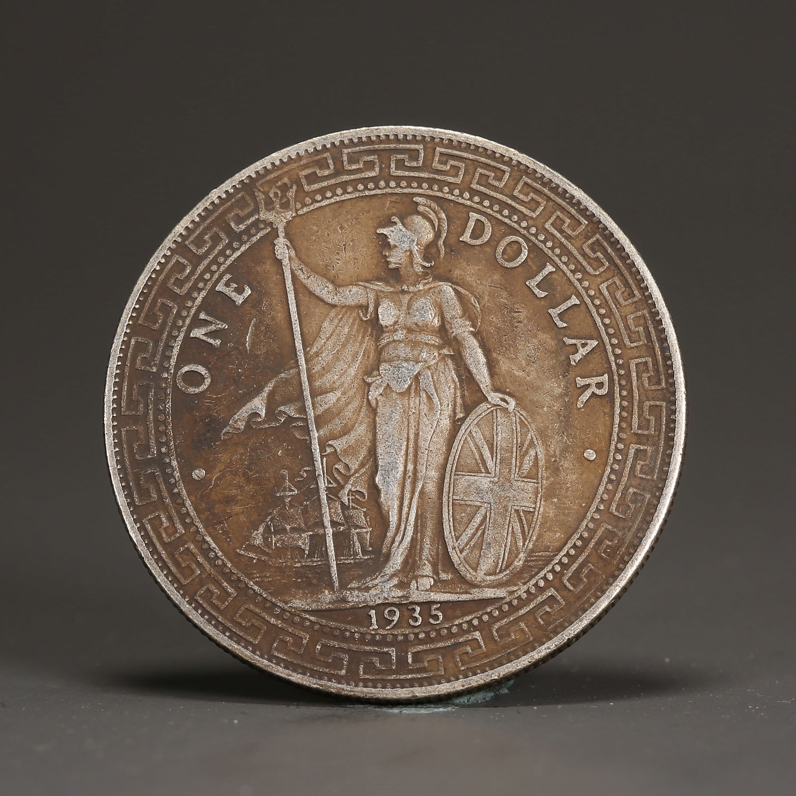 A SILVER DOLLAR COIN (1 of 3)