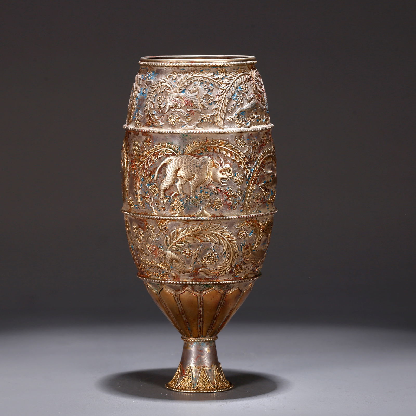 A SILVER CUP WITH GOLD-INLAID AUSPICIOUS BEAST DESIGN (1 of 10)