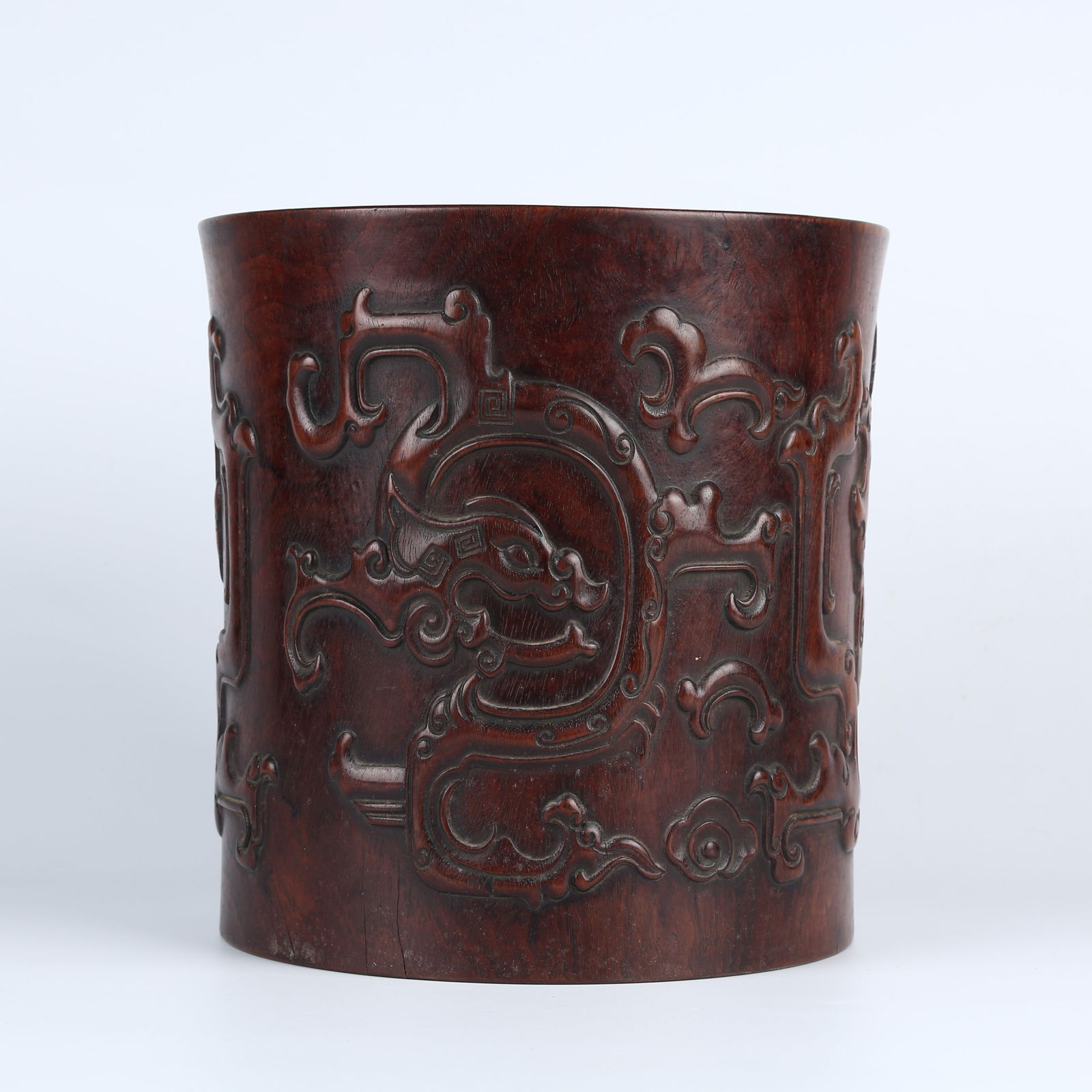 A HUANGHUALI WOOD CARVED CHILONG PATTERN BRUSH POT (1 of 11)
