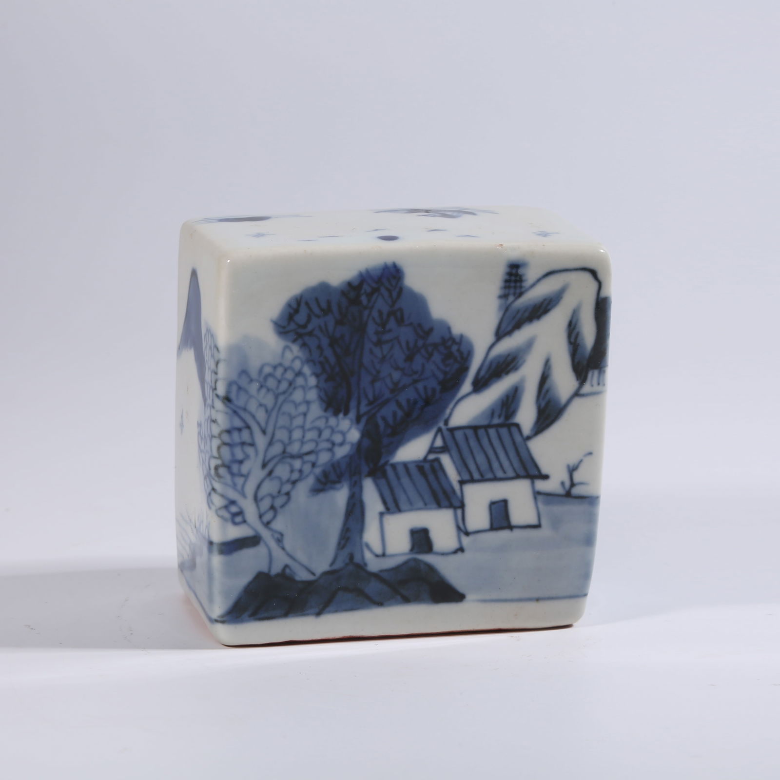 A BLUE-AND-WHITE SEAL WITH LANDSCAPE AND FIGURE PATTERN: Blue-and-White Seal with Landscape and Figure Pattern