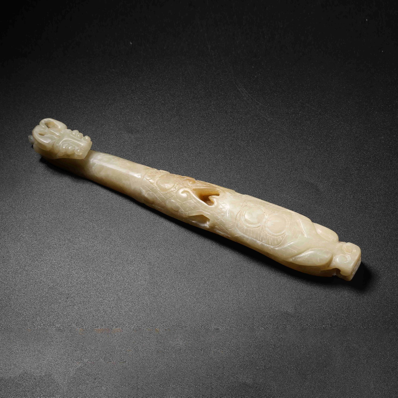 A ARCHAIC JADE DRAGON-HEAD BELT HOOK (1 of 7)