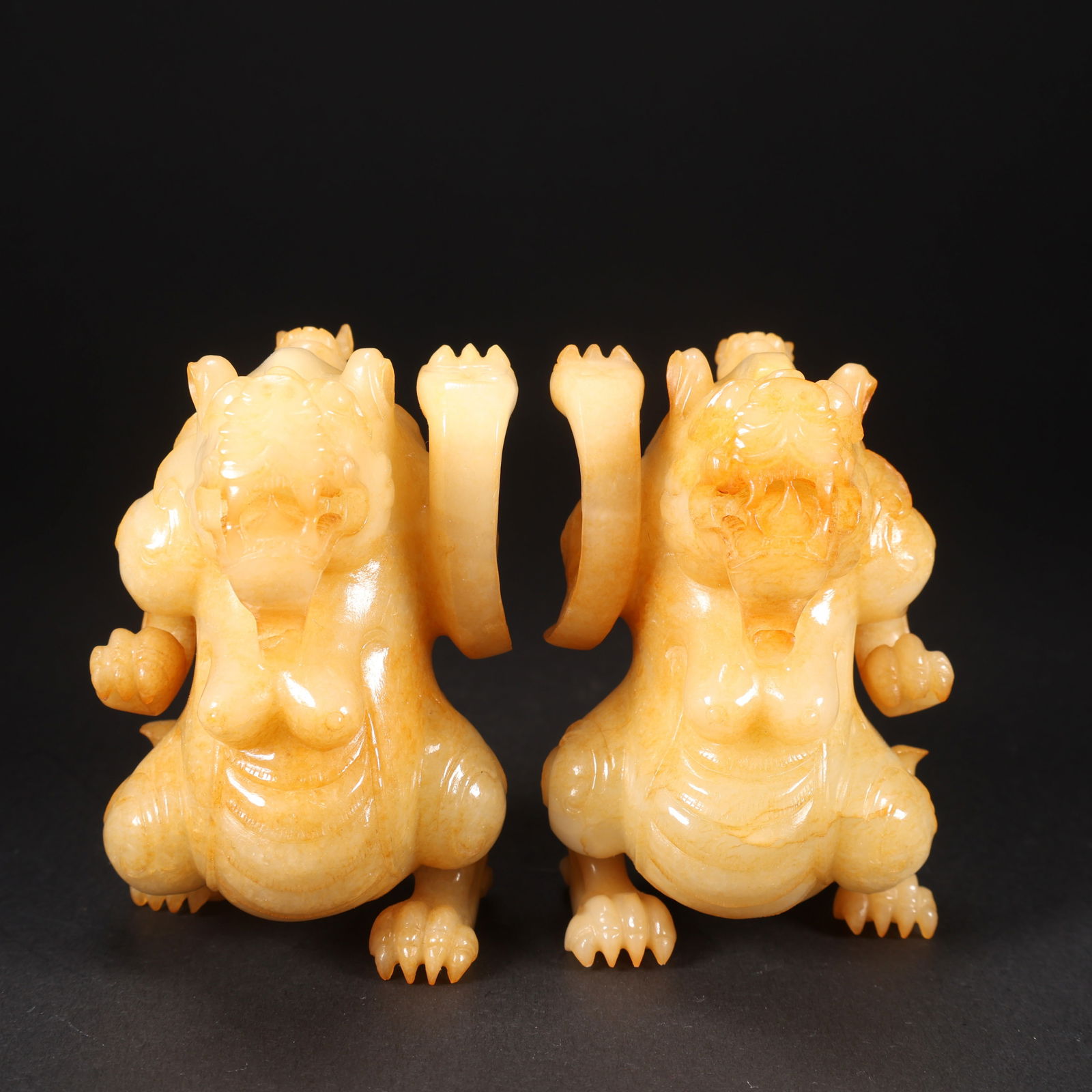 A PAIR OF HETIAN JADE BEARS: Pair of Hetian Jade Bears