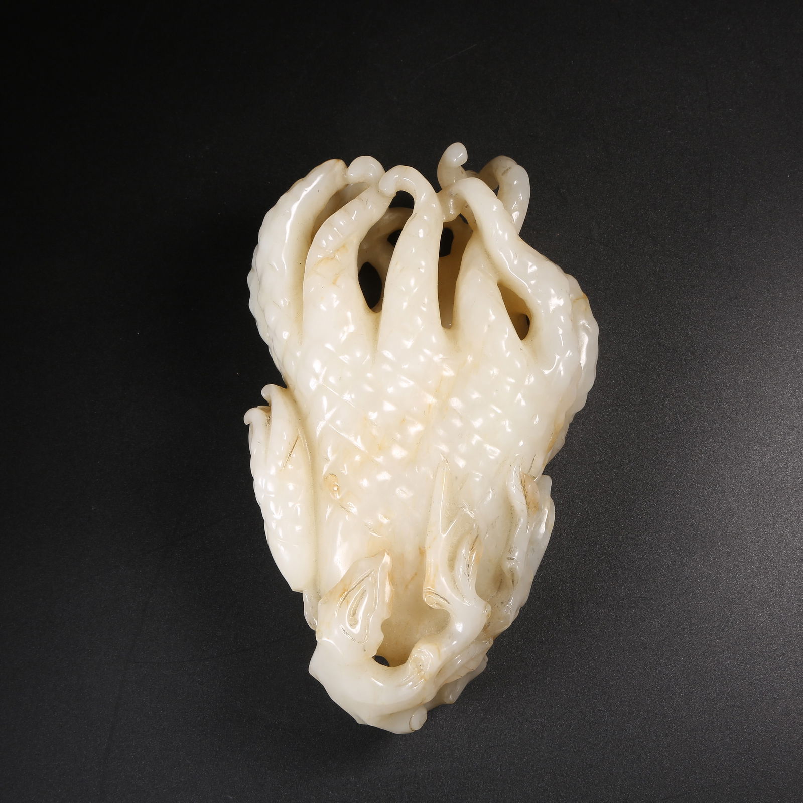 A HETIAN JADE "BUDDHA'S HAND" ORNAMENT (1 of 9)