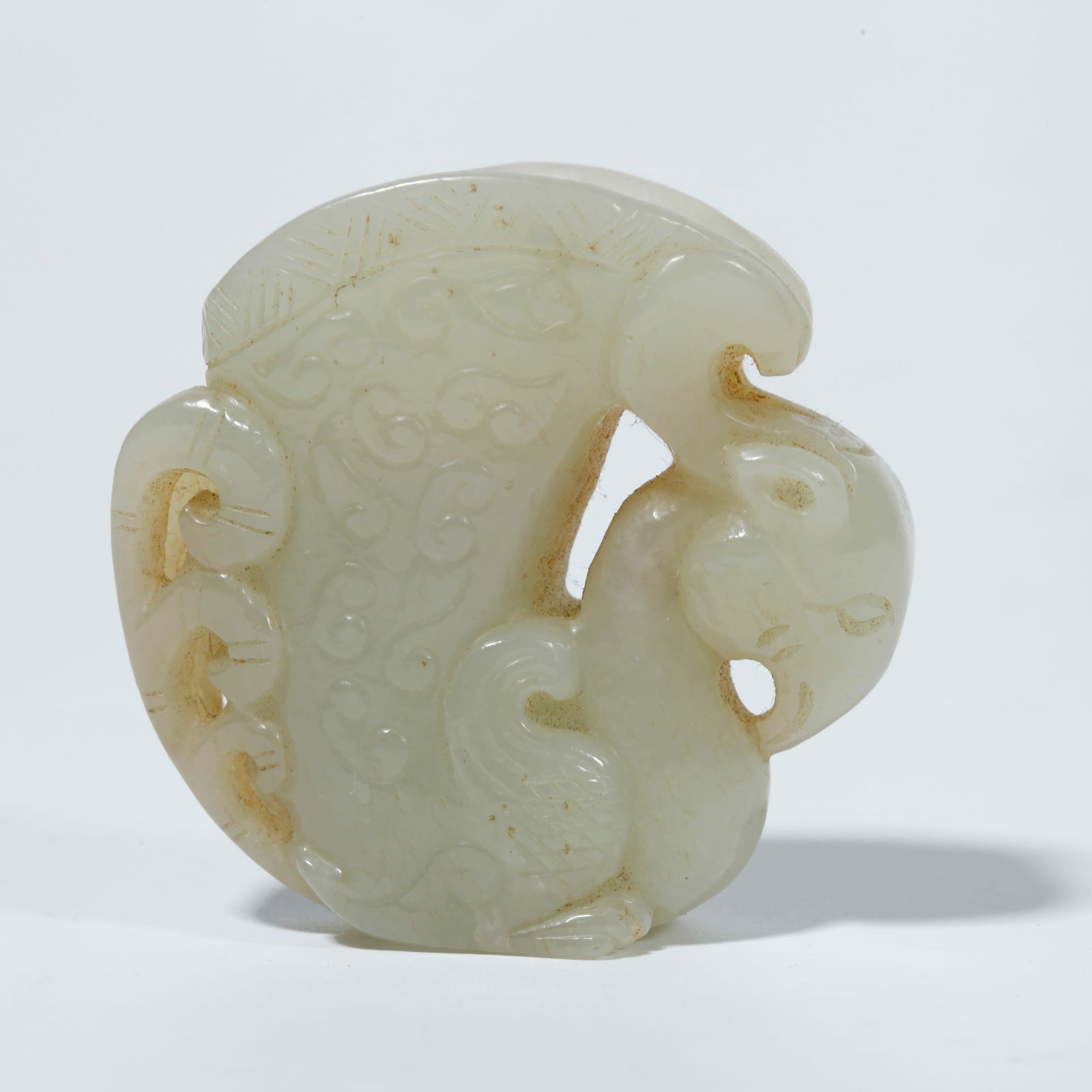 A HETIAN JADE FIGURINE OF AUSPICIOUS BEAST (1 of 9)