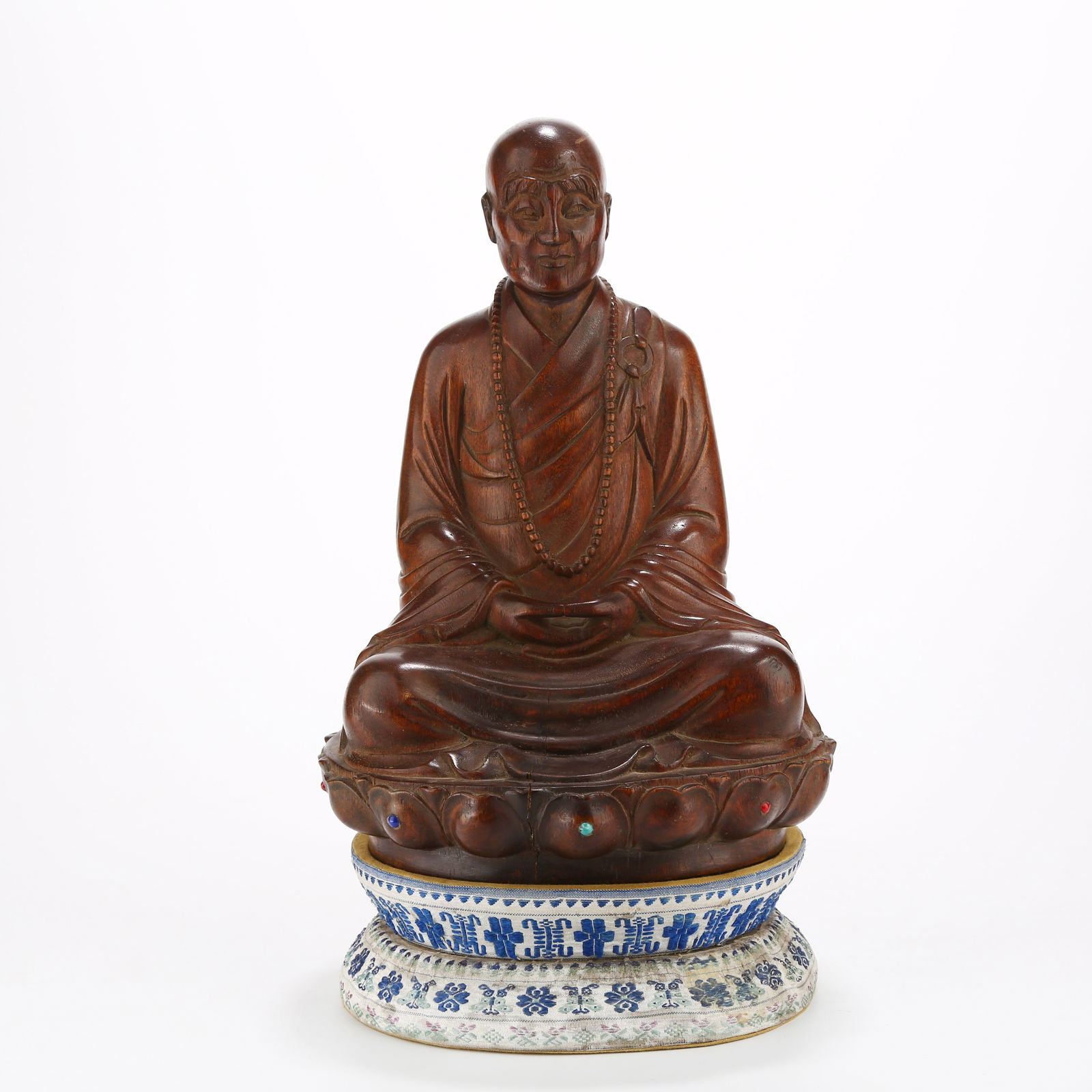 A AGARWOOD ARHAT FIGURINE (1 of 9)