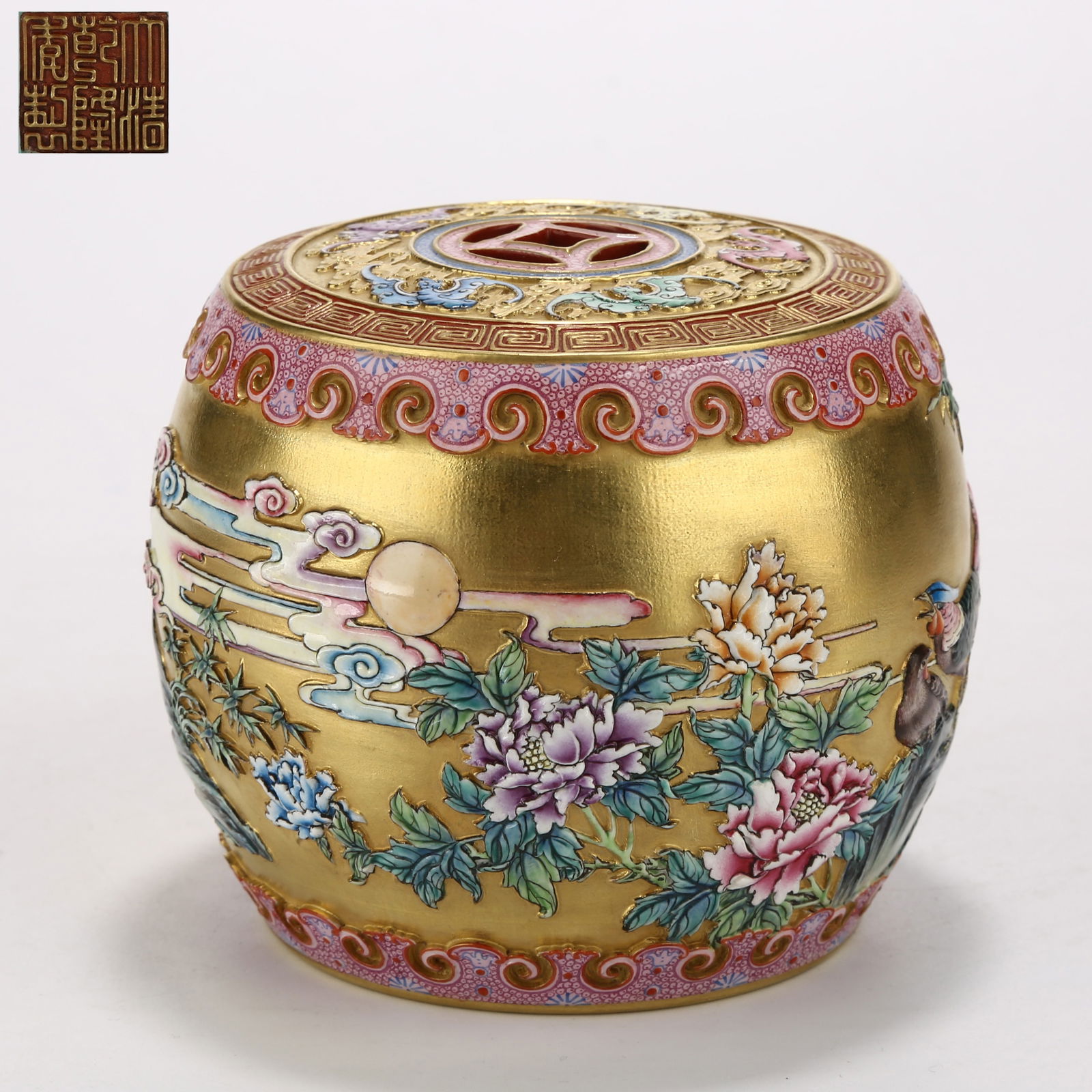 A CARVED PORCELAIN FAMILLE ROSE FLOWER AND BIRD MOTIF SMALL DRUM STOOL (1 of 9)