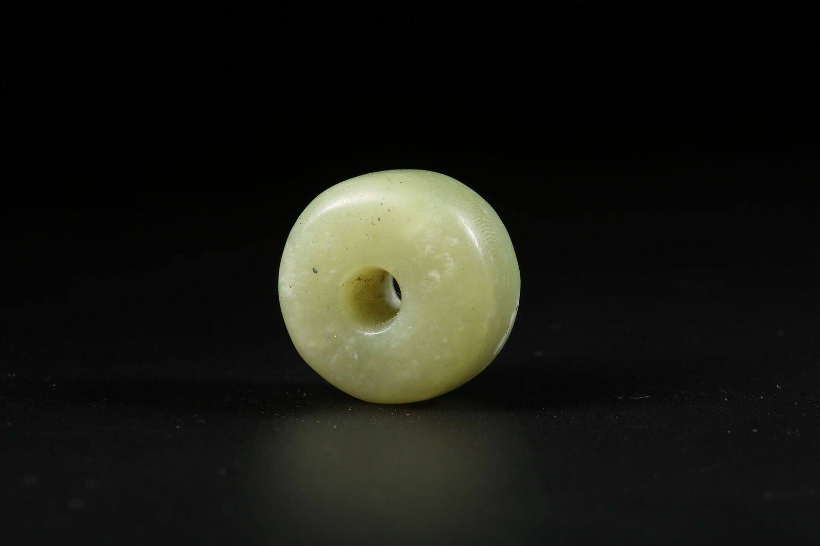 A ARCHAIC JADE BUTTON - 8