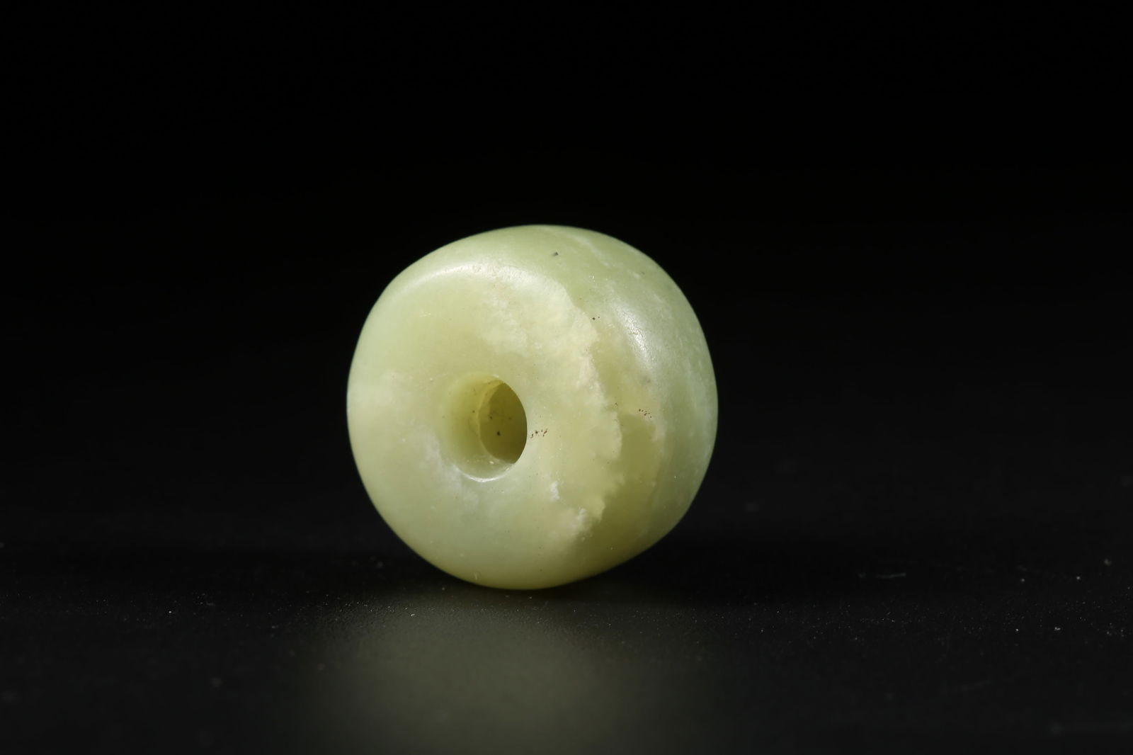A ARCHAIC JADE BUTTON - 9