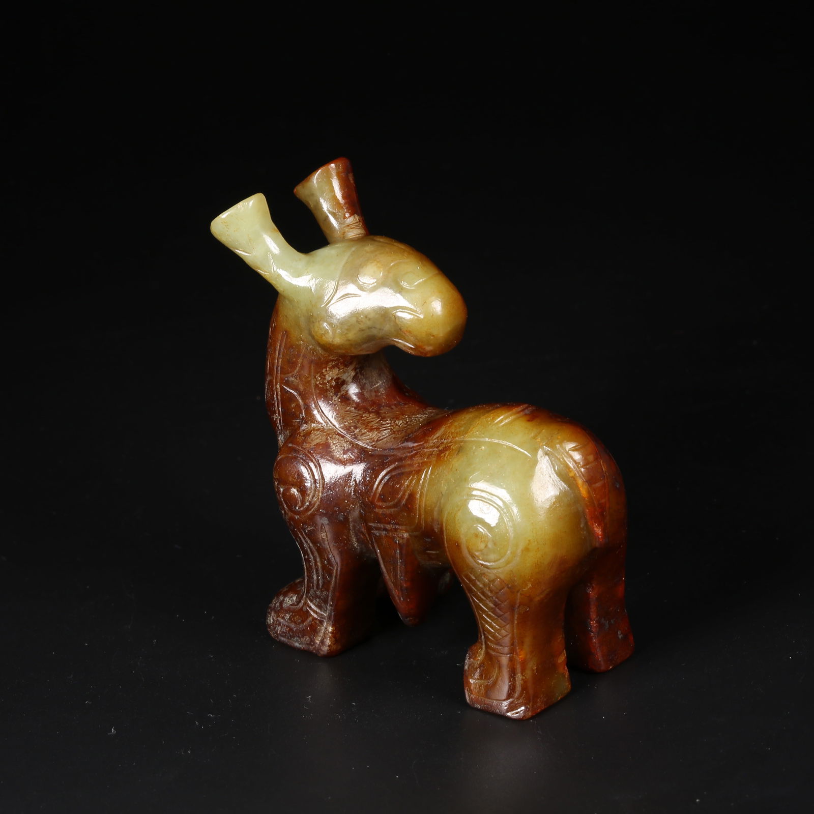 A ARCHAIC JADE AUSPICIOUS BEAST ORNAMENT (1 of 8)