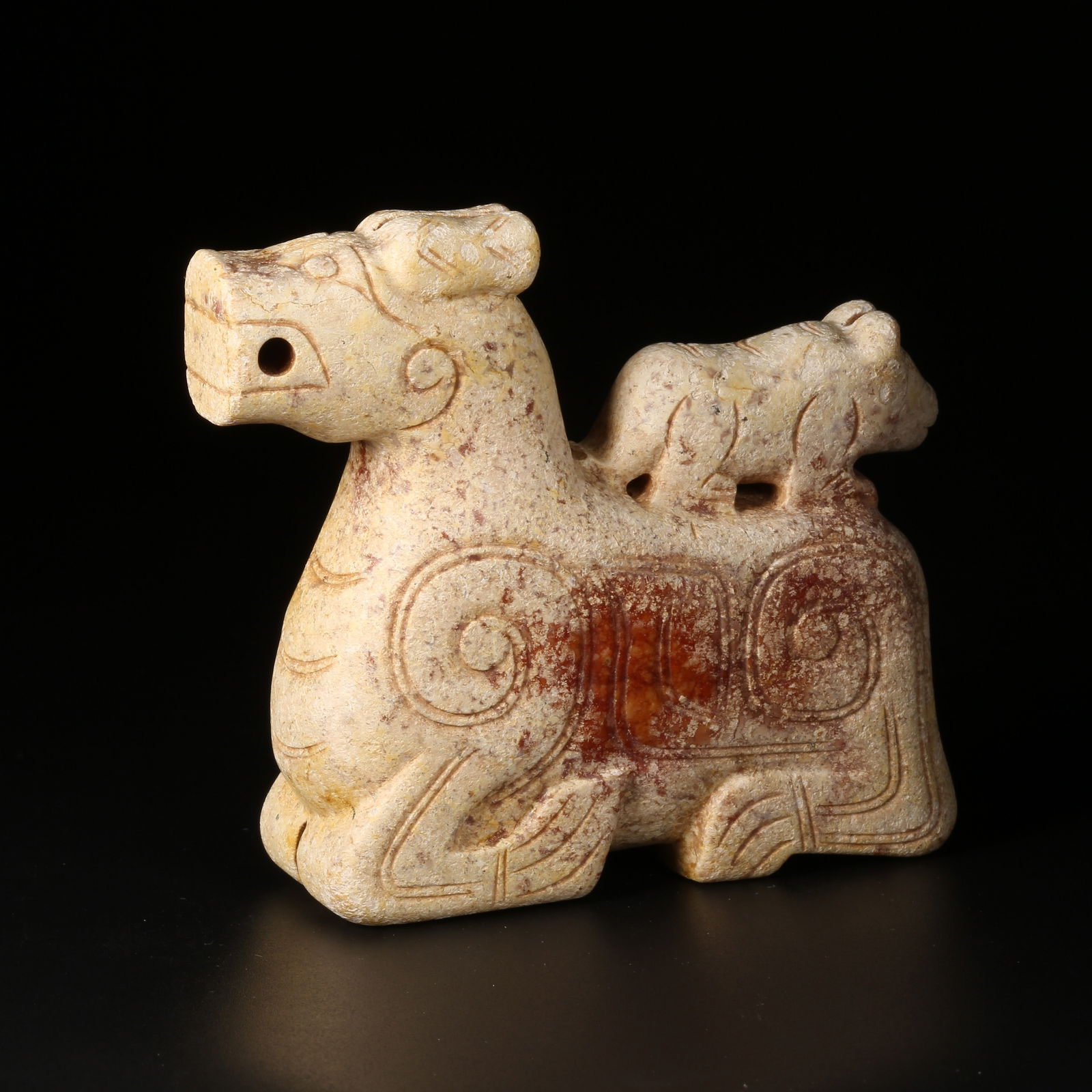 A ARCHAIC JADE AUSPICIOUS BEAST ORNAMENT (1 of 8)