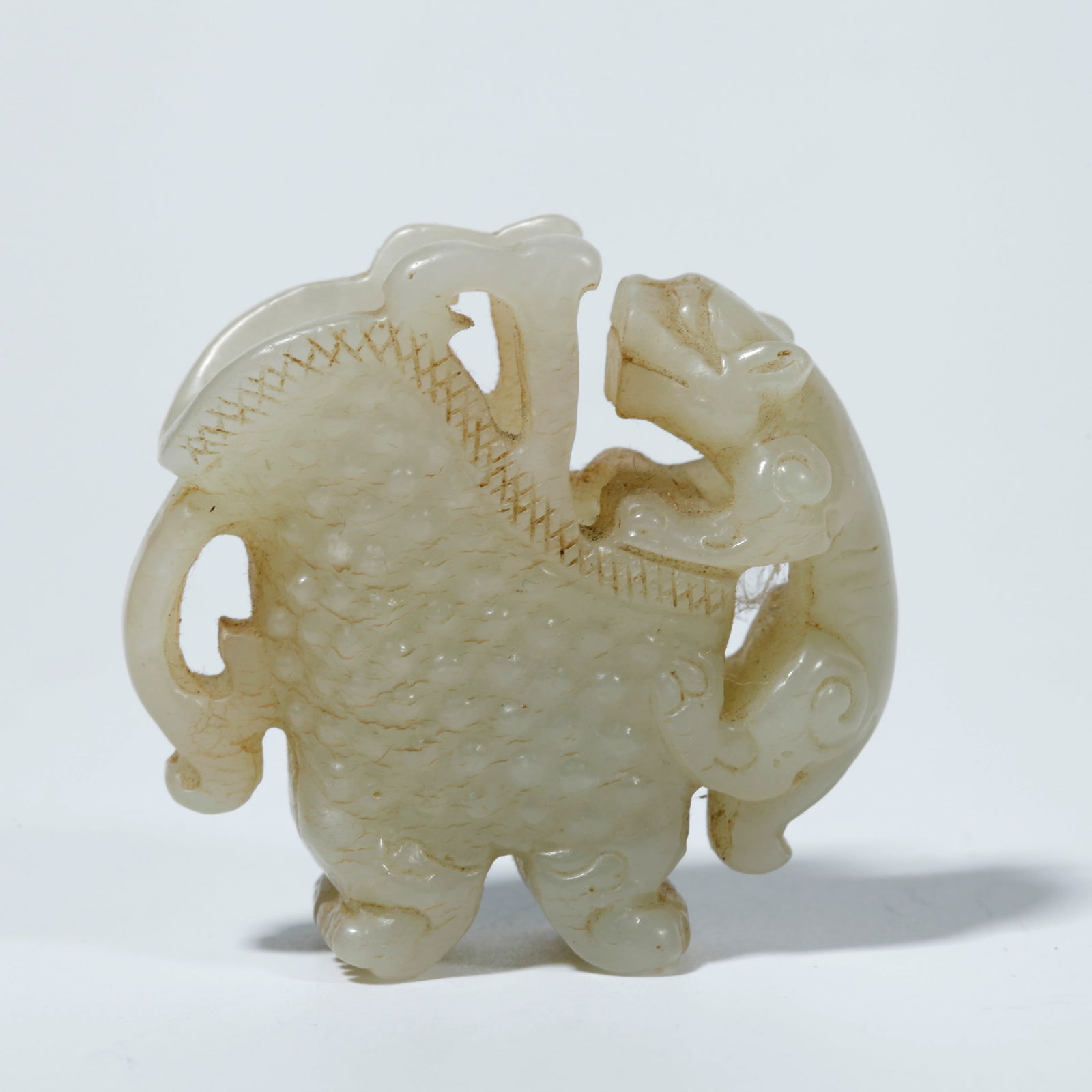 A HETIAN JADE TIGER FIGURINE (1 of 10)