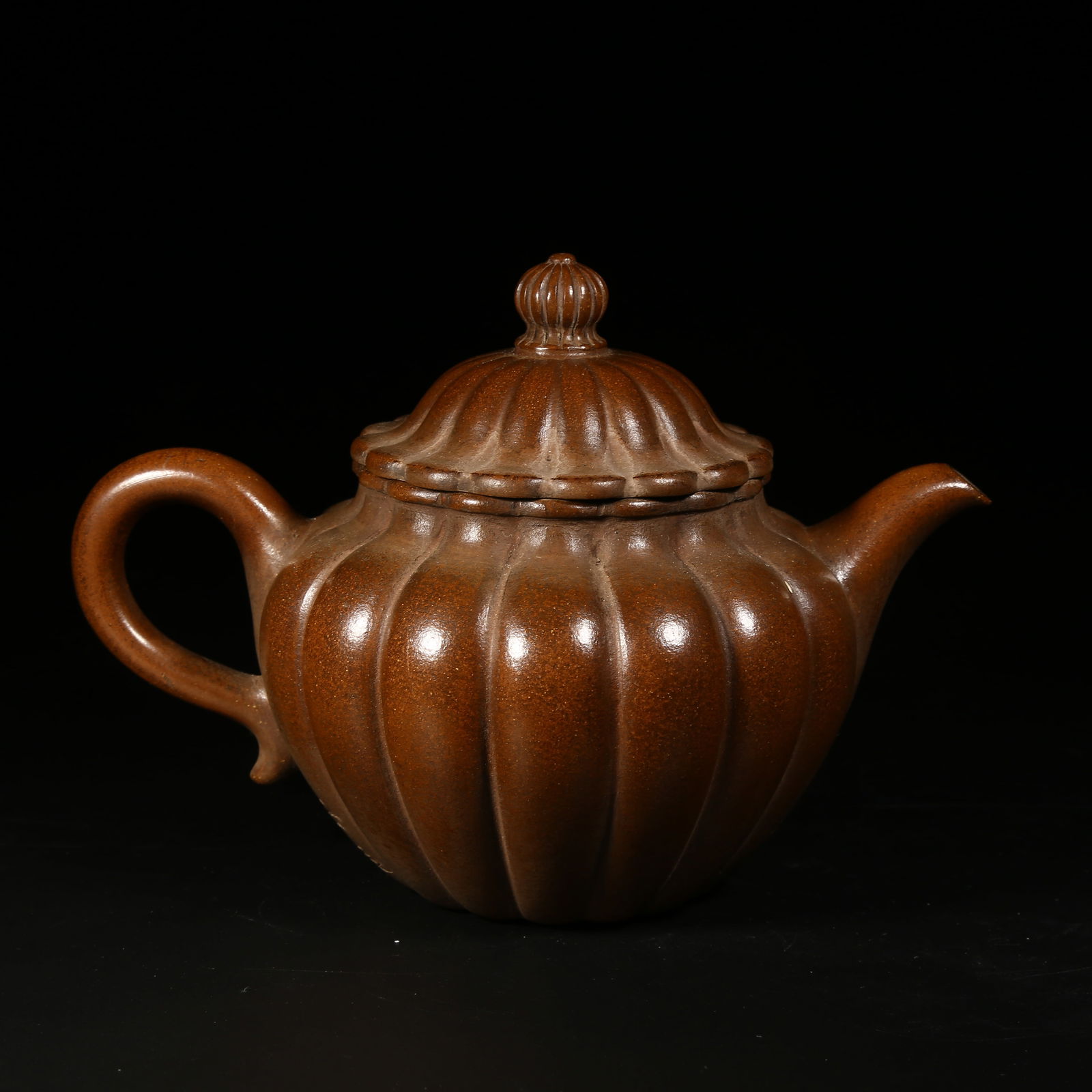 A YIXING ZISHA MULTI-FACETED EWER (1 of 9)
