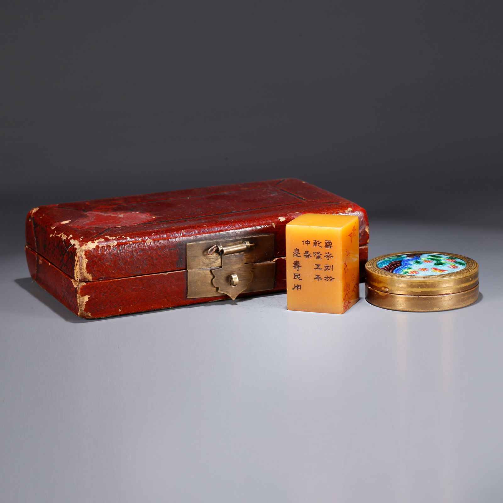 A SHOUSHAN TIANHUANG STONE SEAL WITH FLOWER AND BIRD DESIGN: Shoushan Tianhuang Stone Seal with Flower and Bird Design