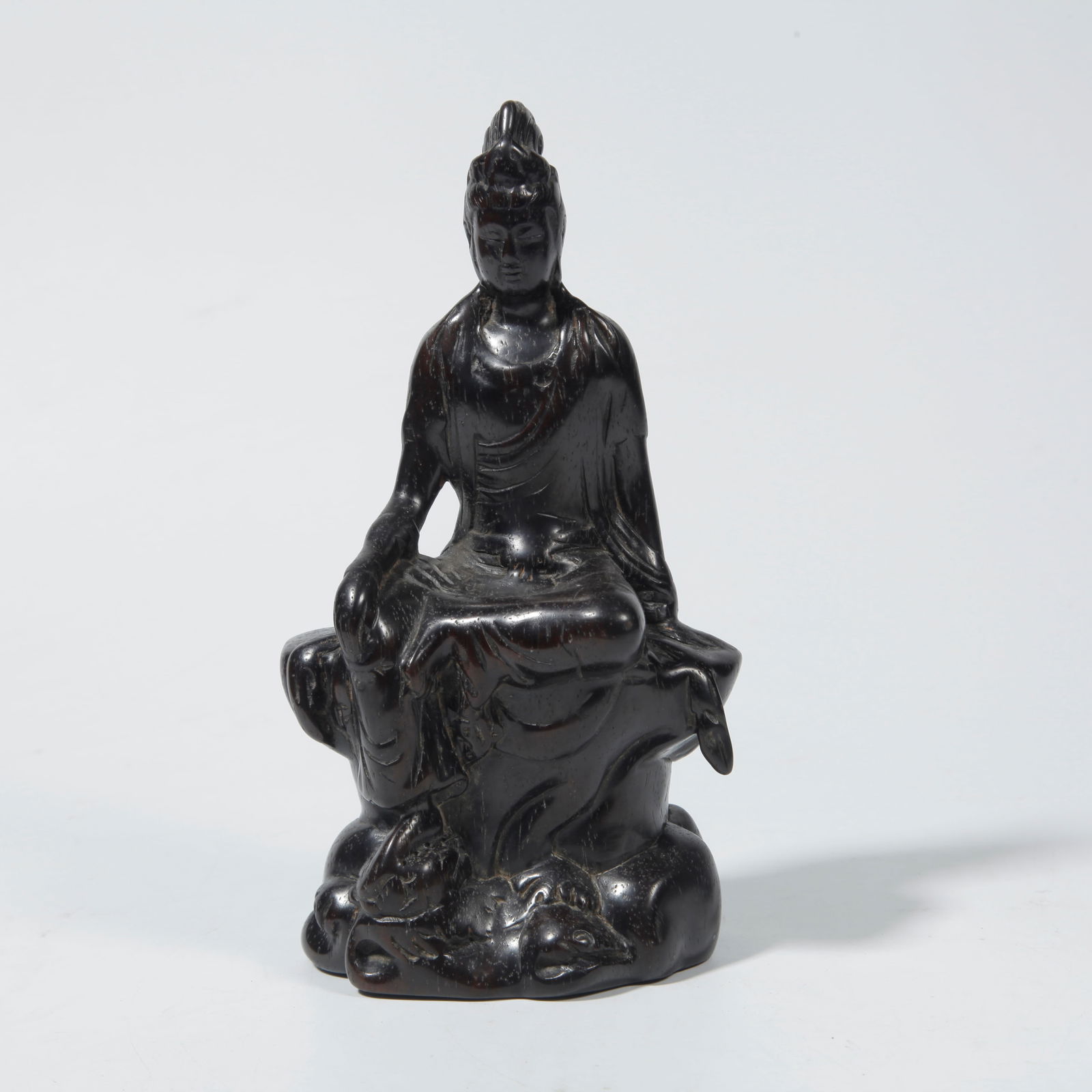 A ZITAN WOOD STATUE OF AVALOKITESHVARA (1 of 8)