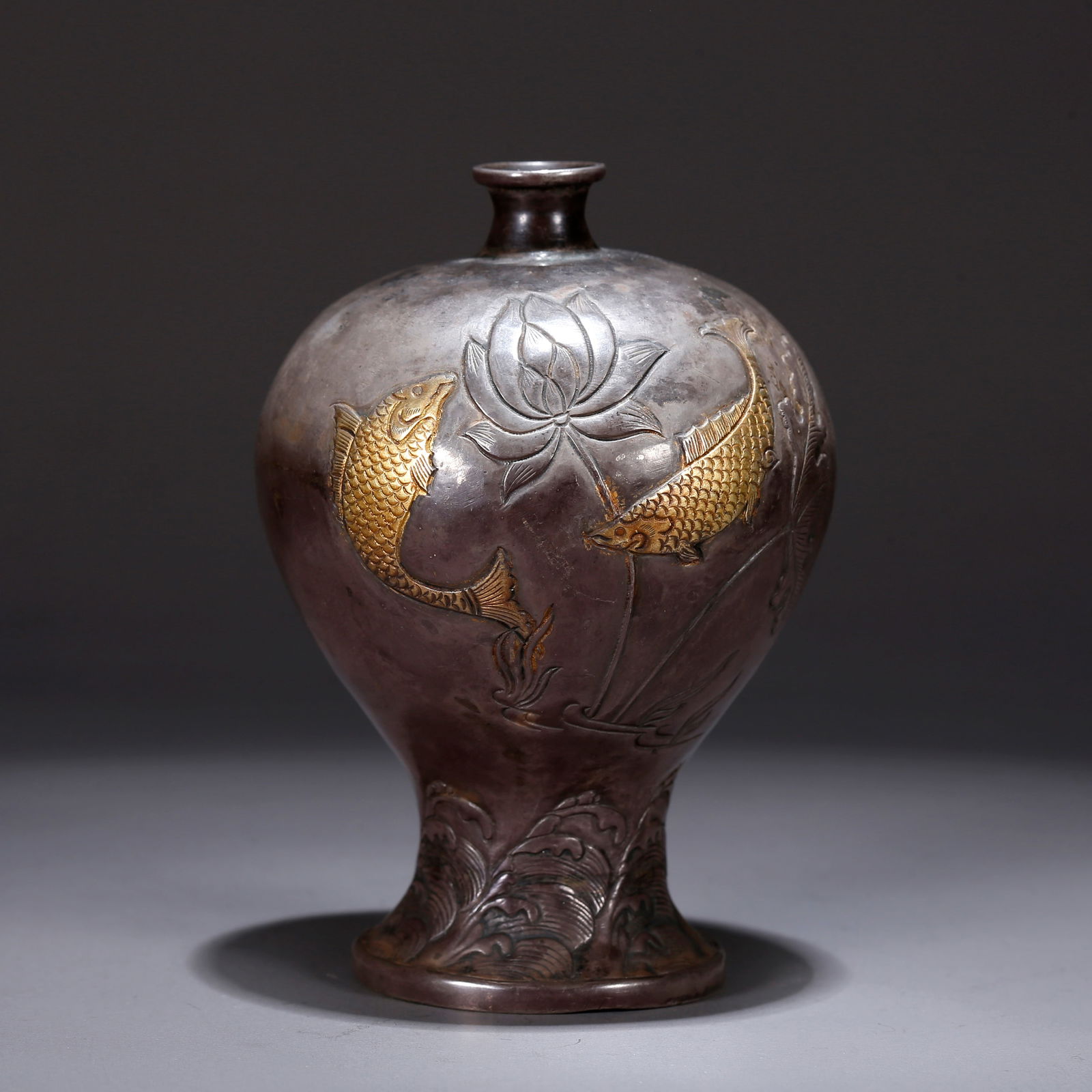 A SILVER MEIPING VASE WITH PARTIAL GILDING AND FISH-TO-DRAGON PATTERN (1 of 10)