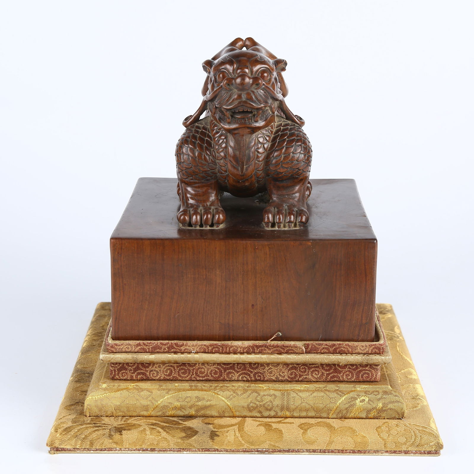 A SANDALWOOD CARVED QILIN KNOB SEAL (1 of 10)