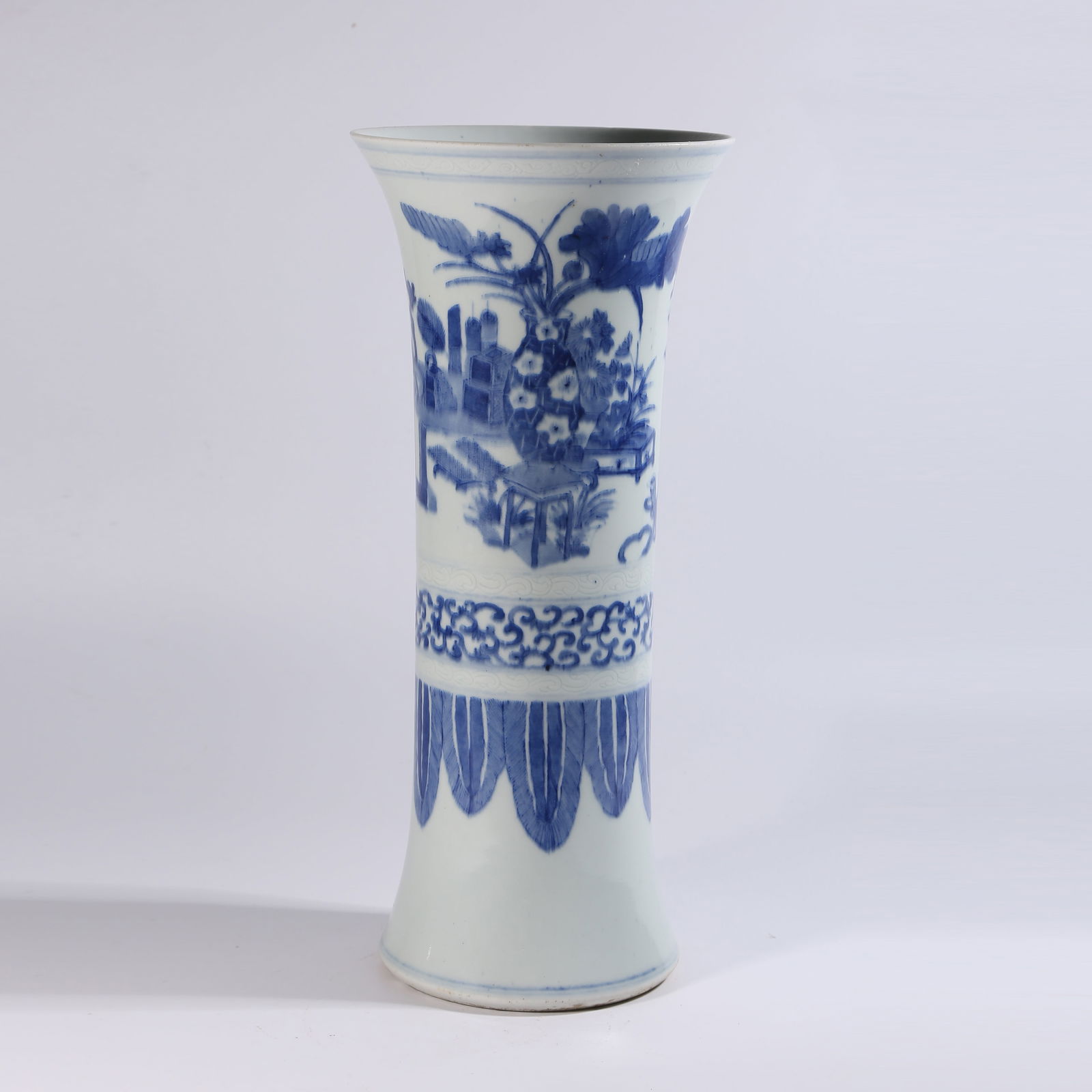 A BLUE-AND-WHITE FLOWER GU WITH SCHOLAR'S ROCK AND FLORAL PATTERN: Blue-and-White Flower Gu with Scholar's Rock and Floral Pattern