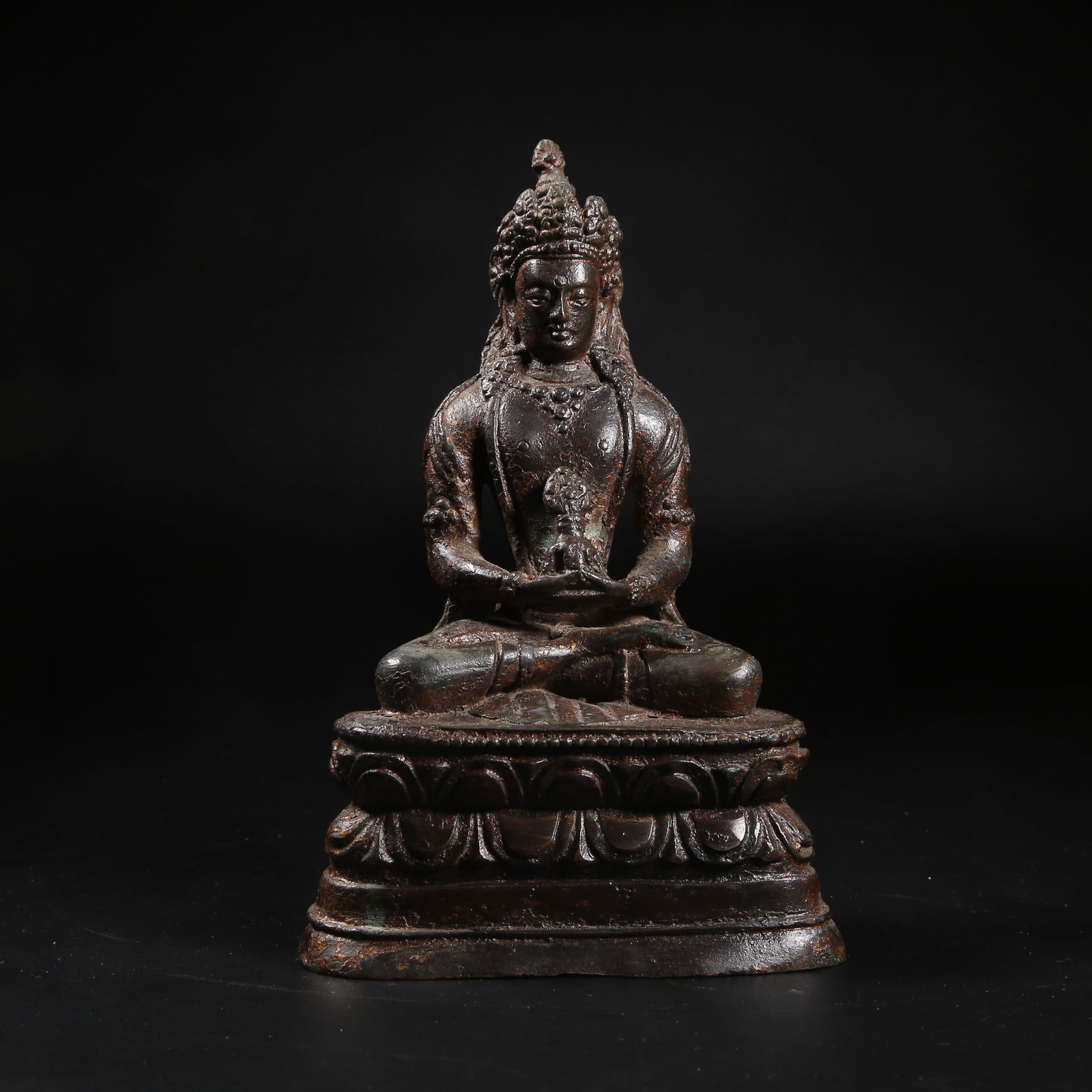 A GILT-BRONZE STATUE OF THE LONGEVITY BUDDHA (1 of 8)