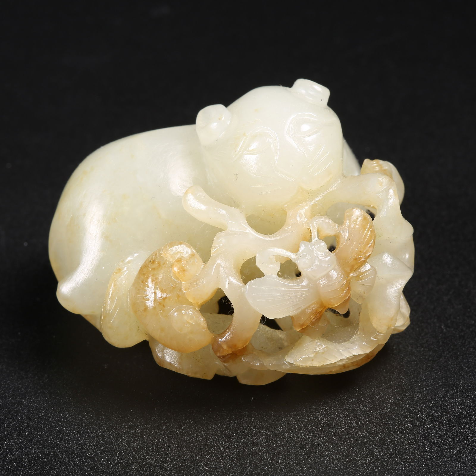 A HETIAN JADE AUSPICIOUS BEAST OFFERING LONGEVITY ORNAMENT (1 of 8)