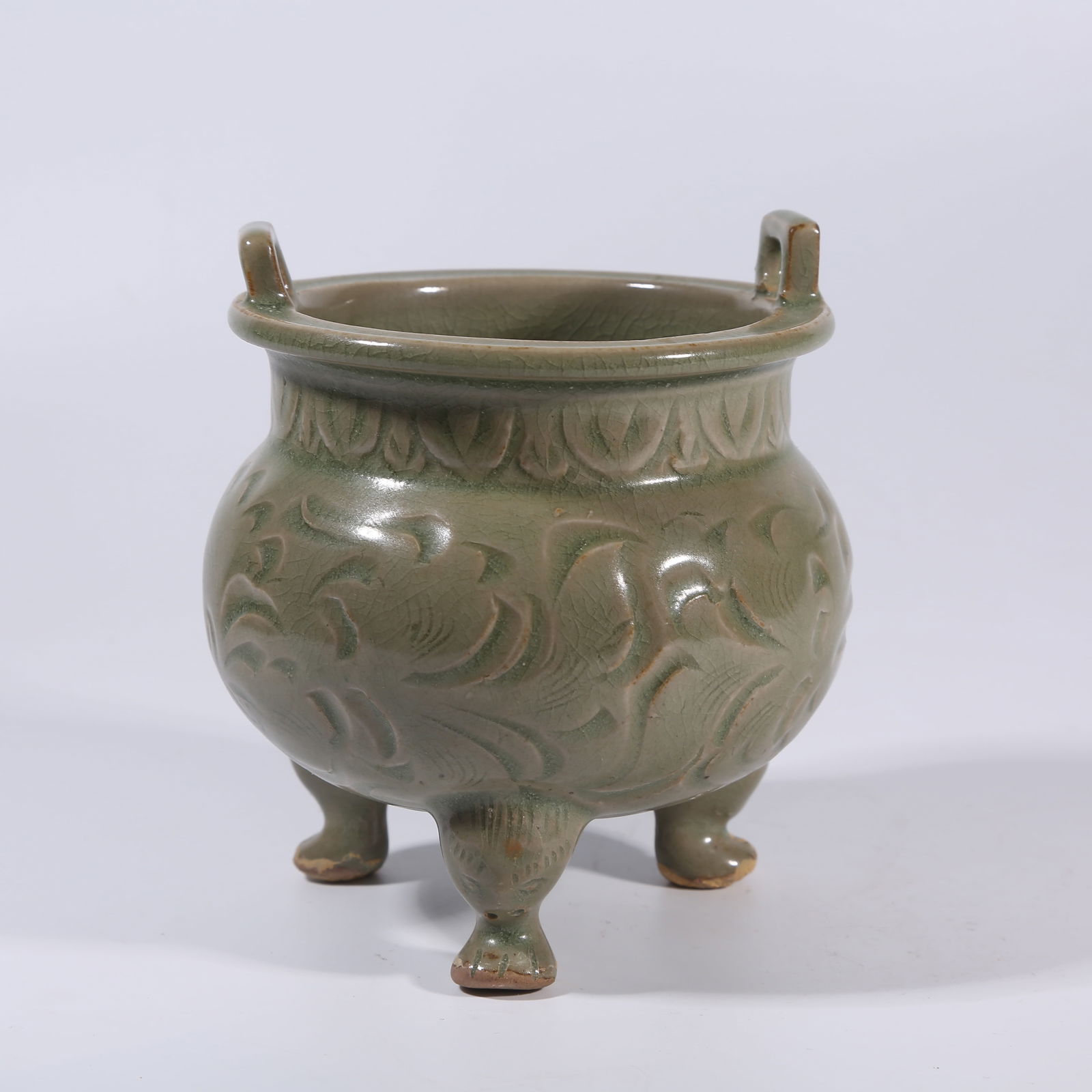 A YAOZHOU WARE CARVED FLORAL CENSER WITH DOUBLE HANDLES AND THREE FEET (1 of 9)