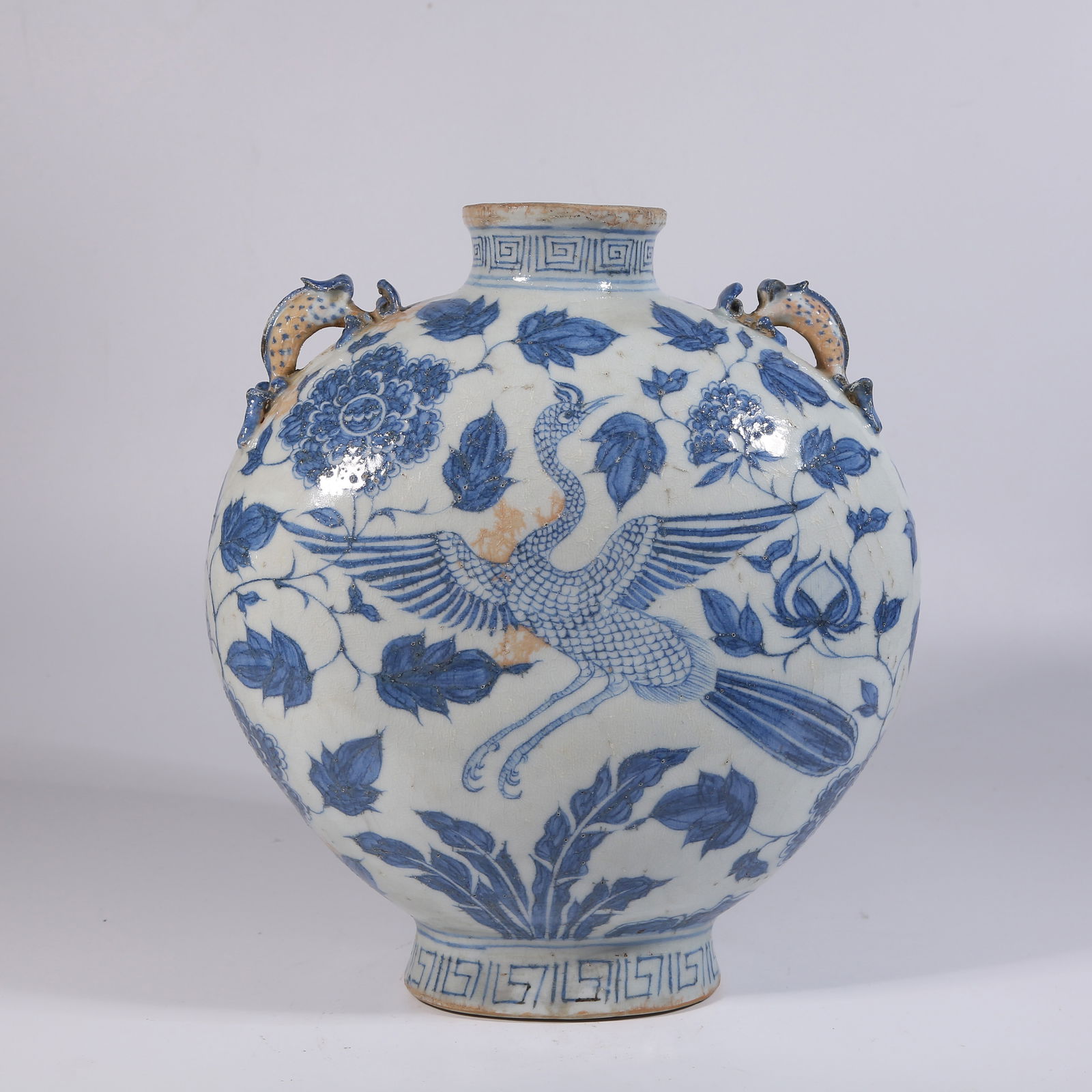 A BLUE-AND-WHITE MOON-EMBRACING VASE WITH PIERCED FLOWER-AND-PHOENIX PATTERN (1 of 9)