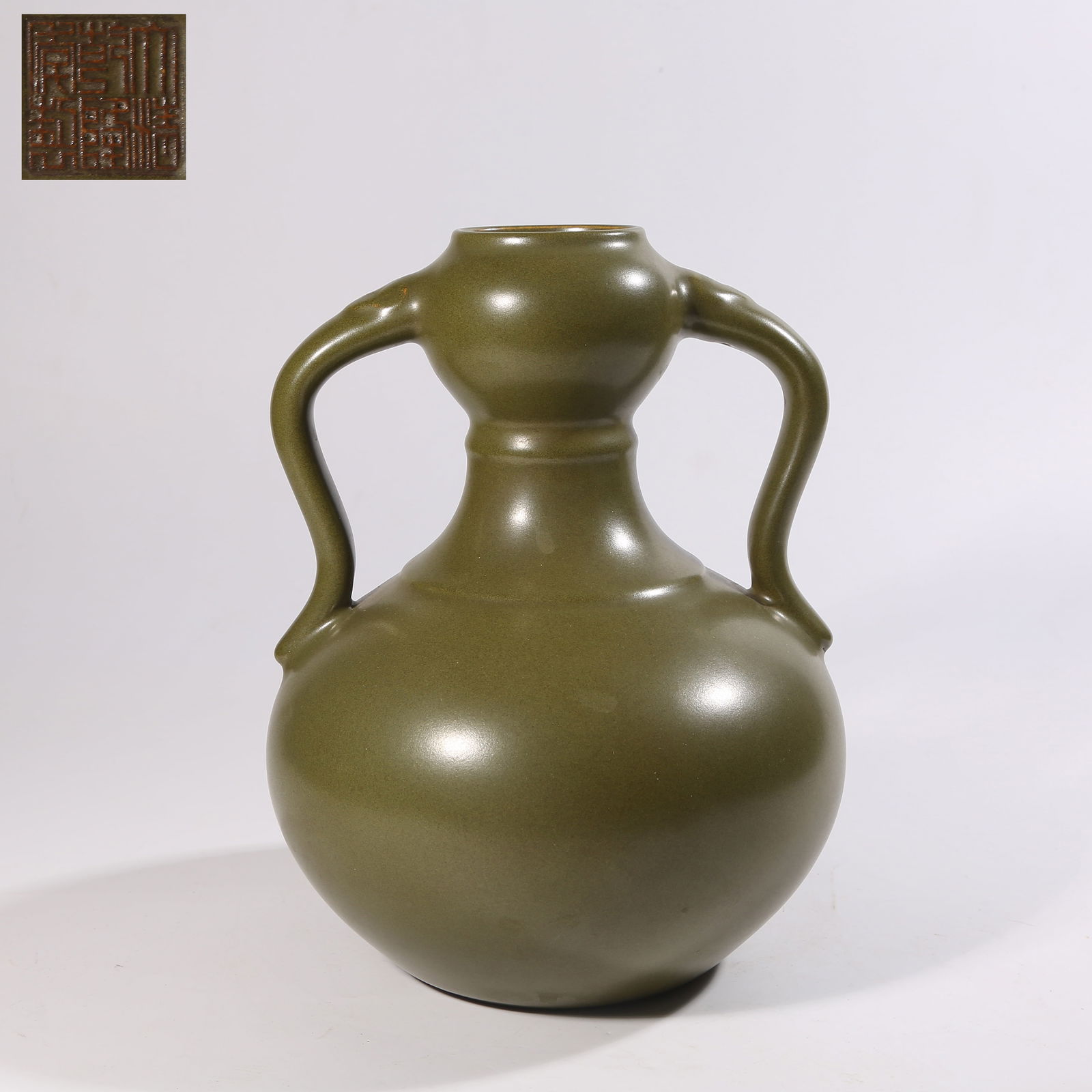 A TEA-DUST GLAZE GOURD-SHAPED VASE WITH RIBBON HANDLES (1 of 9)