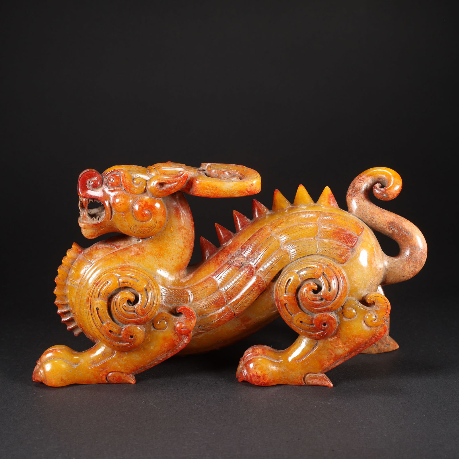 A HETIAN YELLOW JADE AUSPICIOUS BEAST (1 of 9)