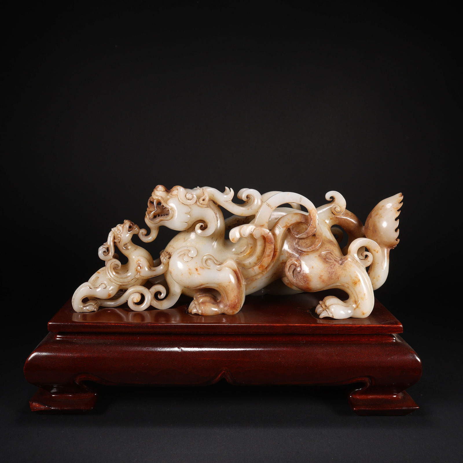 A HETIAN JADE MOTHER-AND-CHILD BEASTS ON WOODEN BASE (1 of 9)