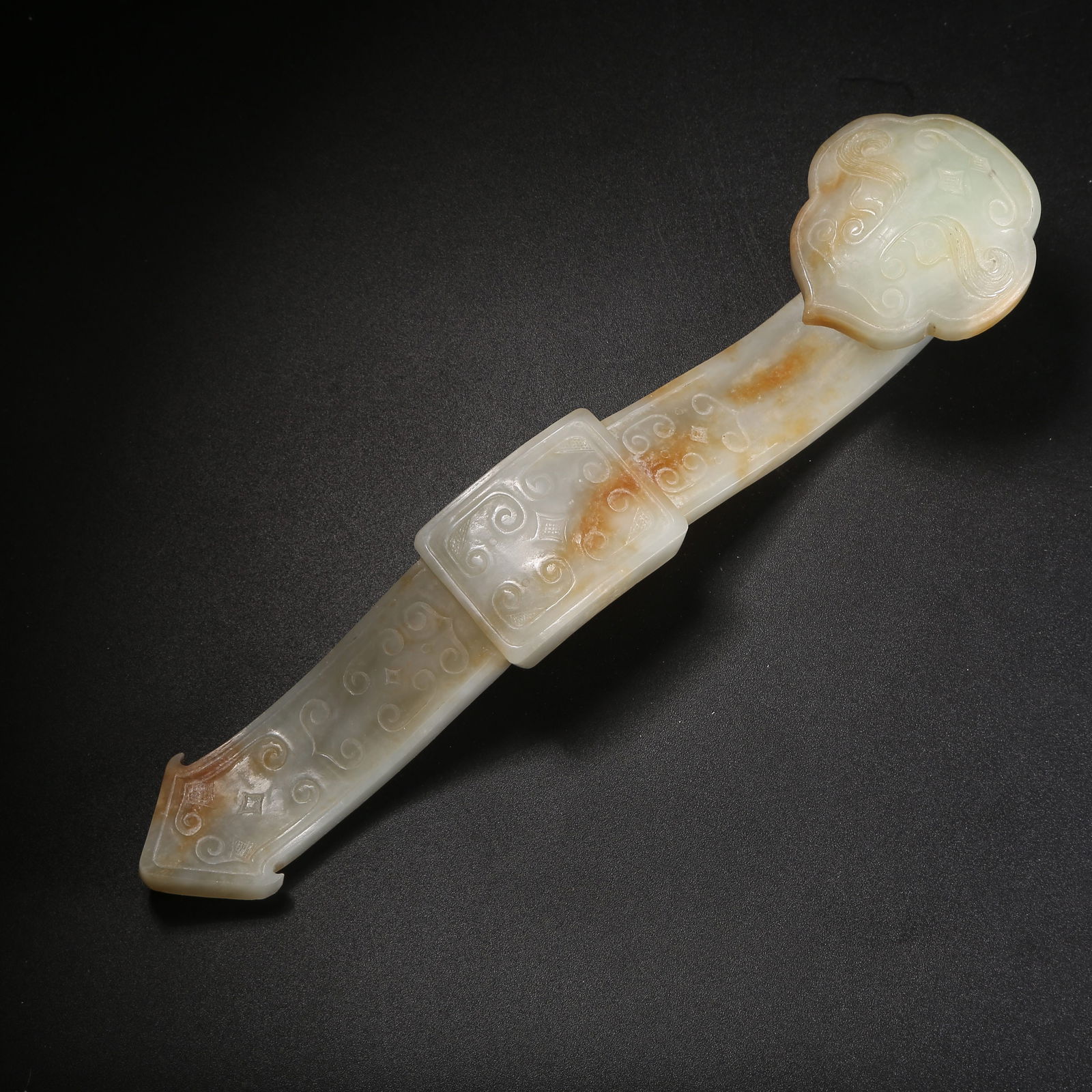 A HETIAN JADE RUYI WITH BEAST FACE PATTERN (1 of 10)