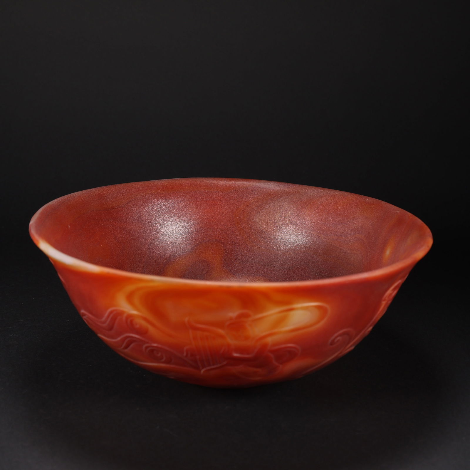 A AGATE BOWL WITH FLYING APSARAS AND FLORAL SCROLL MOTIFS (1 of 9)