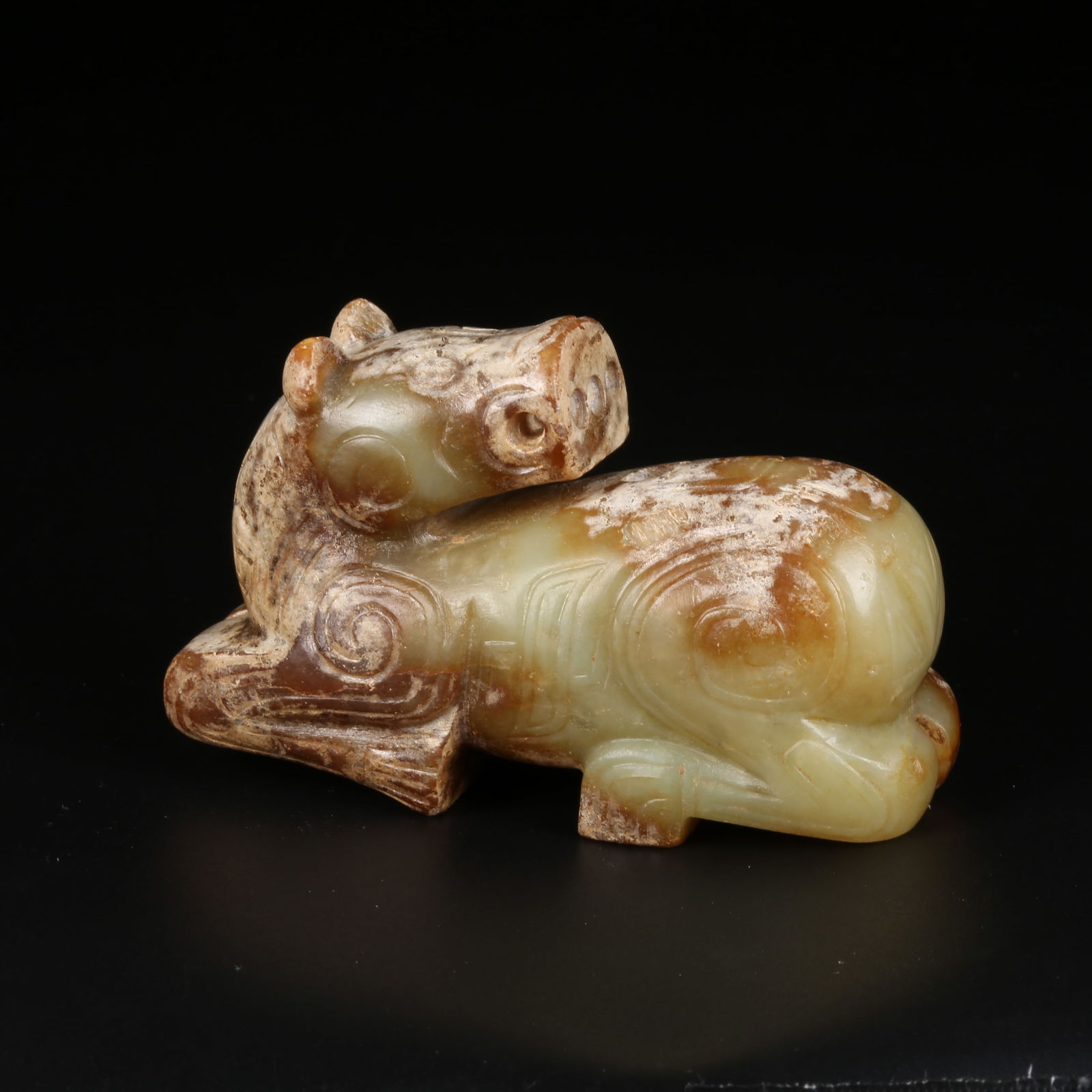A ARCHAIC JADE AUSPICIOUS BEAST PENDANT (1 of 8)