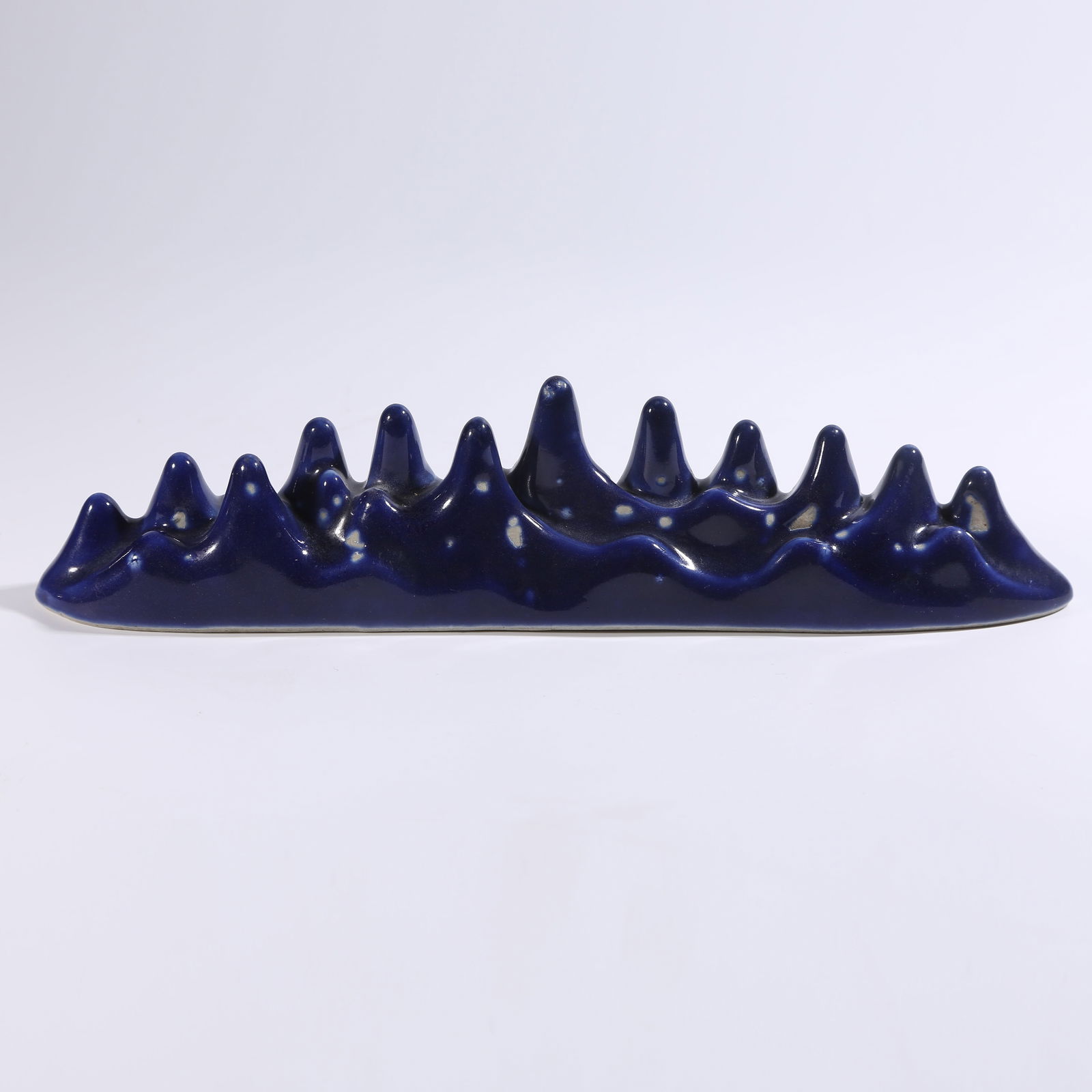 A JILAN GLAZED MOUNTAIN-SHAPED BRUSH REST (1 of 8)