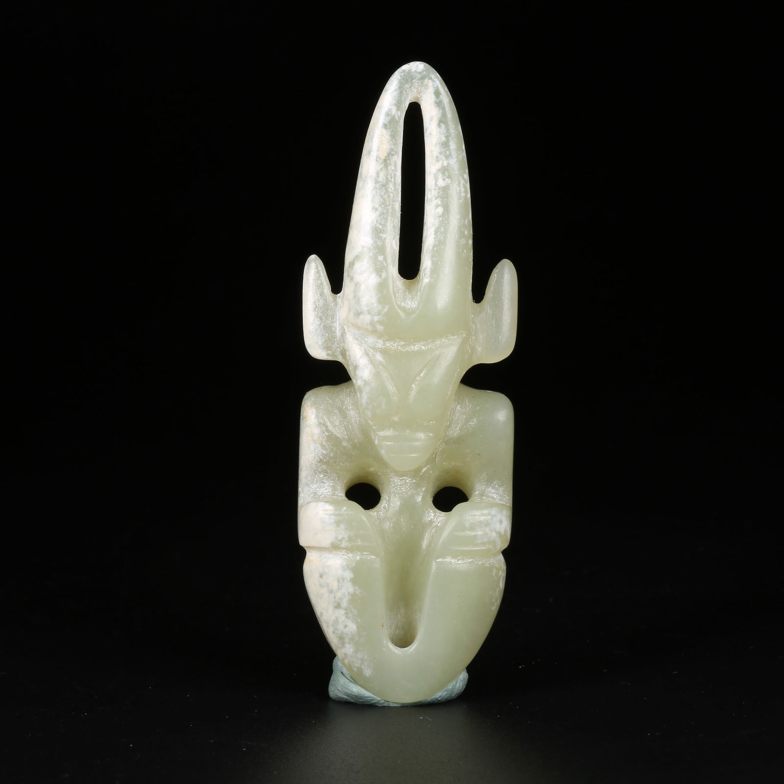 A ARCHAIC JADE SUN GOD: Archaic jade Sun God