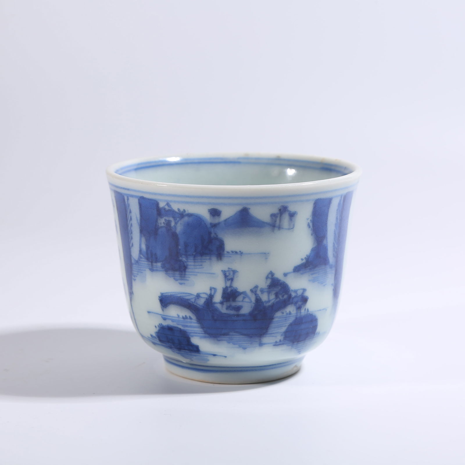 A BLUE-AND-WHITE DUN-STYLE CUP WITH LANDSCAPE AND FIGURE PATTERN AND INSCRIBED POEM (1 of 9)