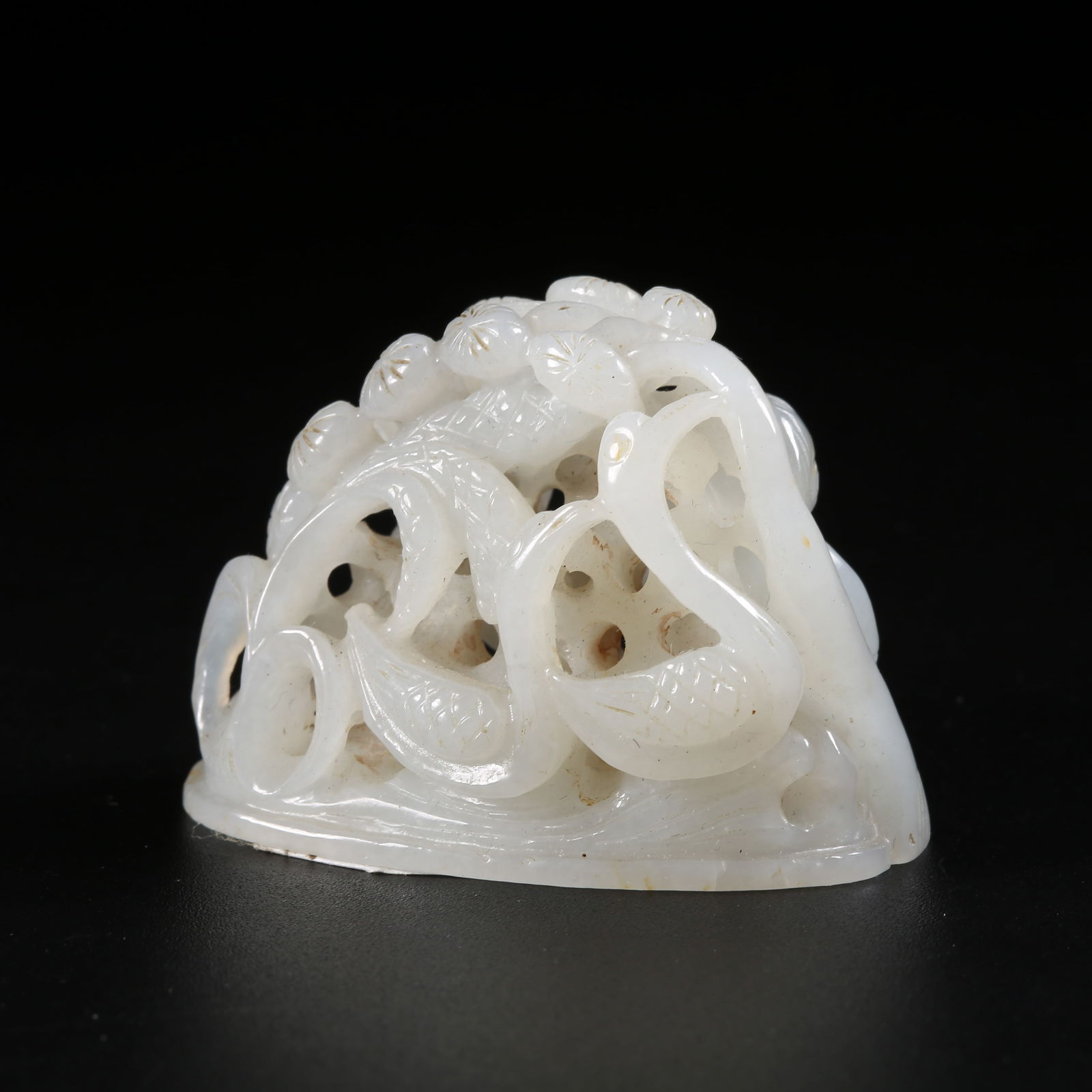 A HETIAN JADE CENSER IN FORM OF A CHILD PLAYING WITH BEASTS: Hetian Jade Censer in Form of a Child Playing with Beasts