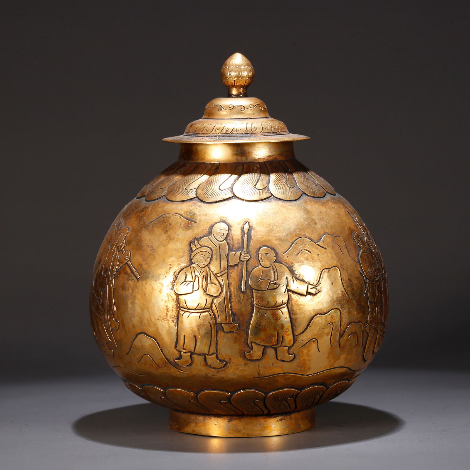 A GILT BRONZE LIDDED JAR WITH FIGURE STORY DESIGN (1 of 9)