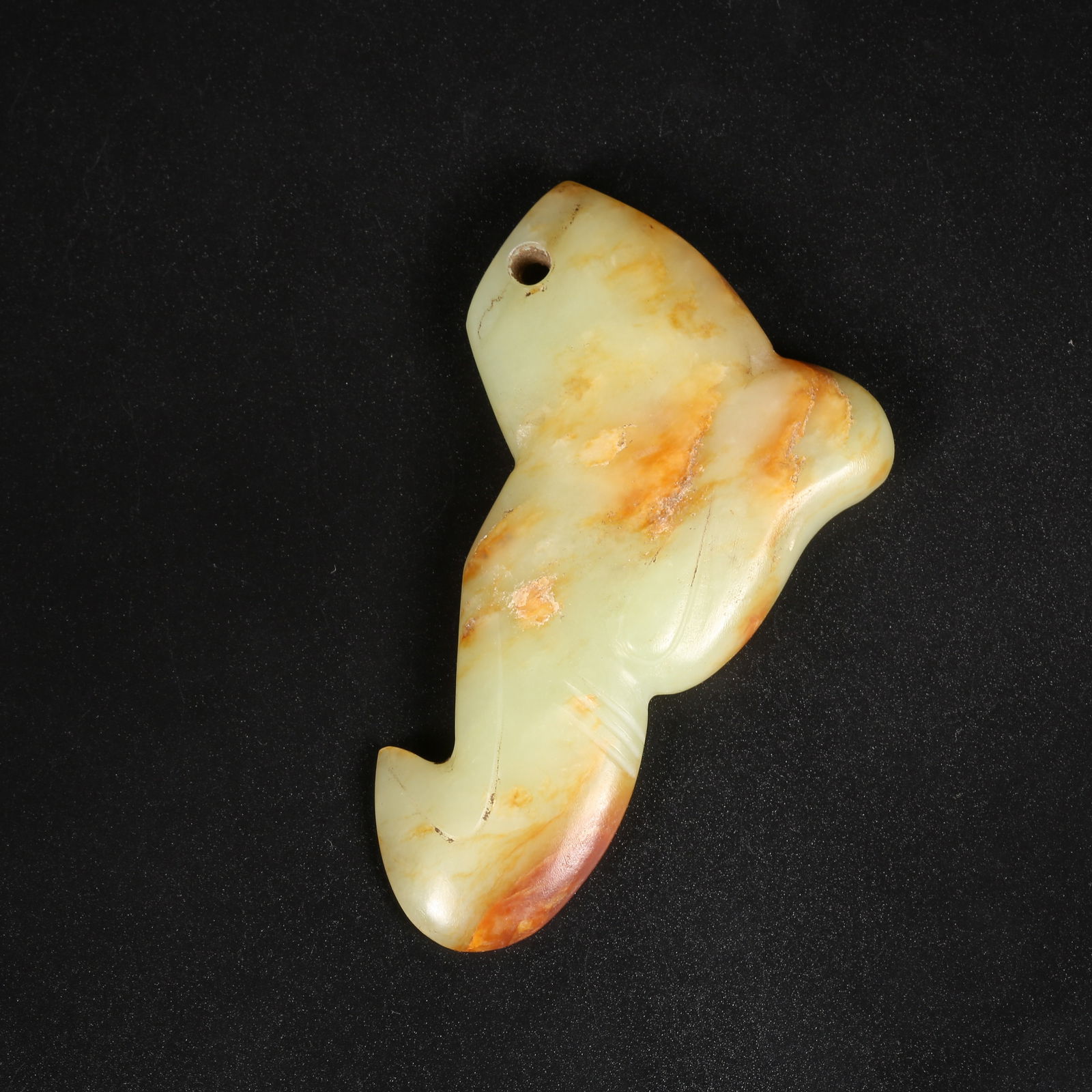 A ARCHAIC JADE PENDANT (1 of 7)