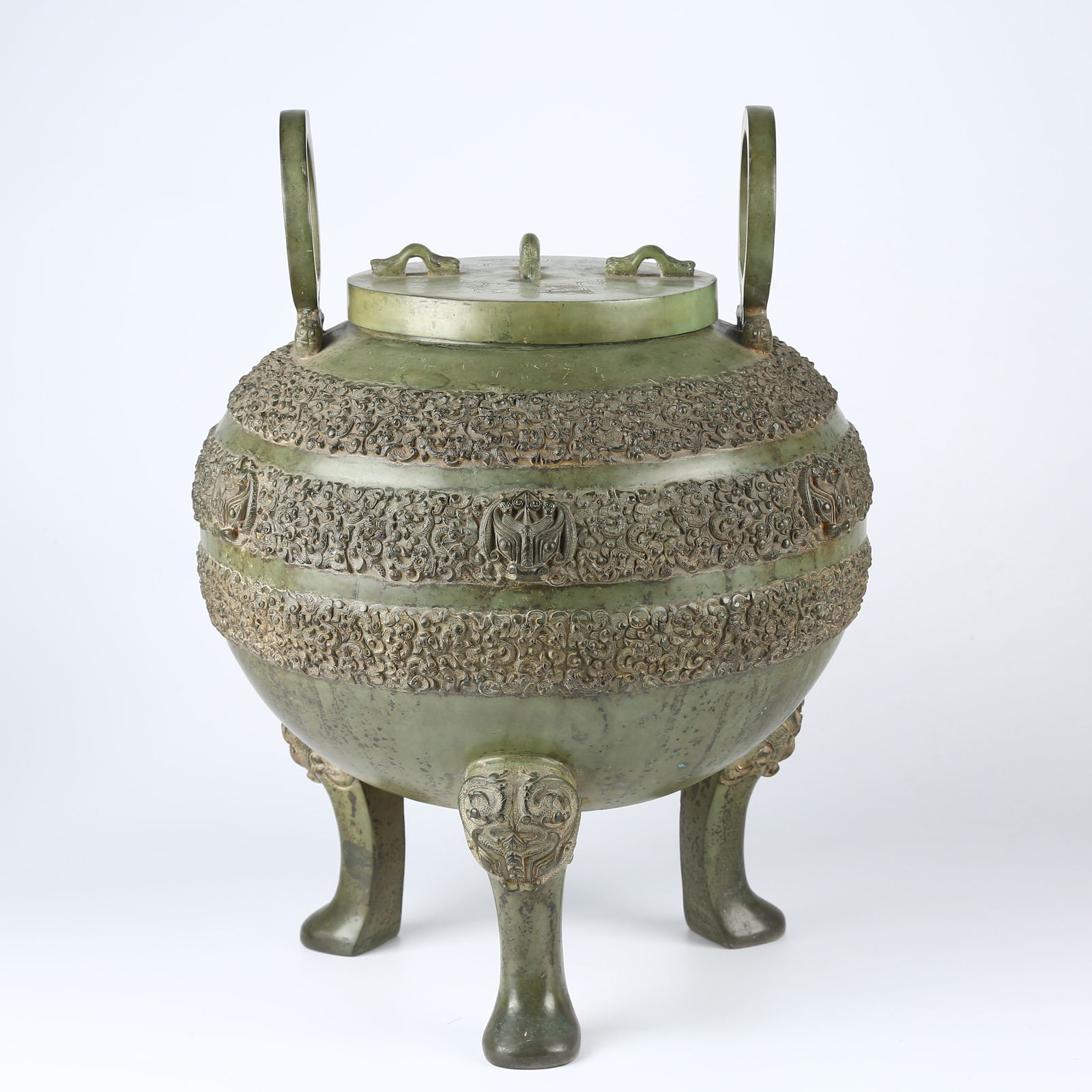 A BRONZE THREE-LEGGED CENSER: Bronze Three-Legged Censer