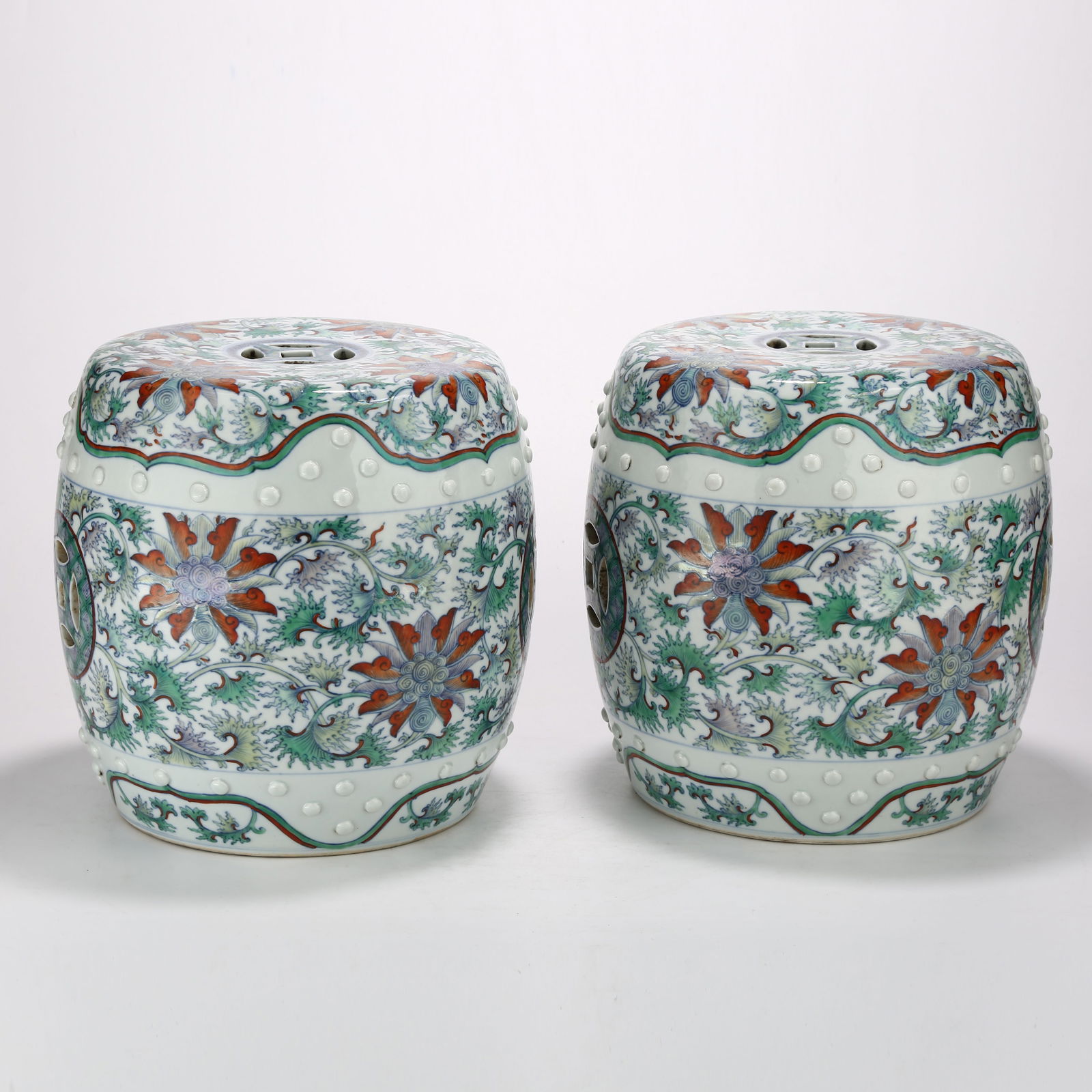 A DOUCAI SCROLL GRASS MOTIF DRUM STOOL SET (1 of 10)