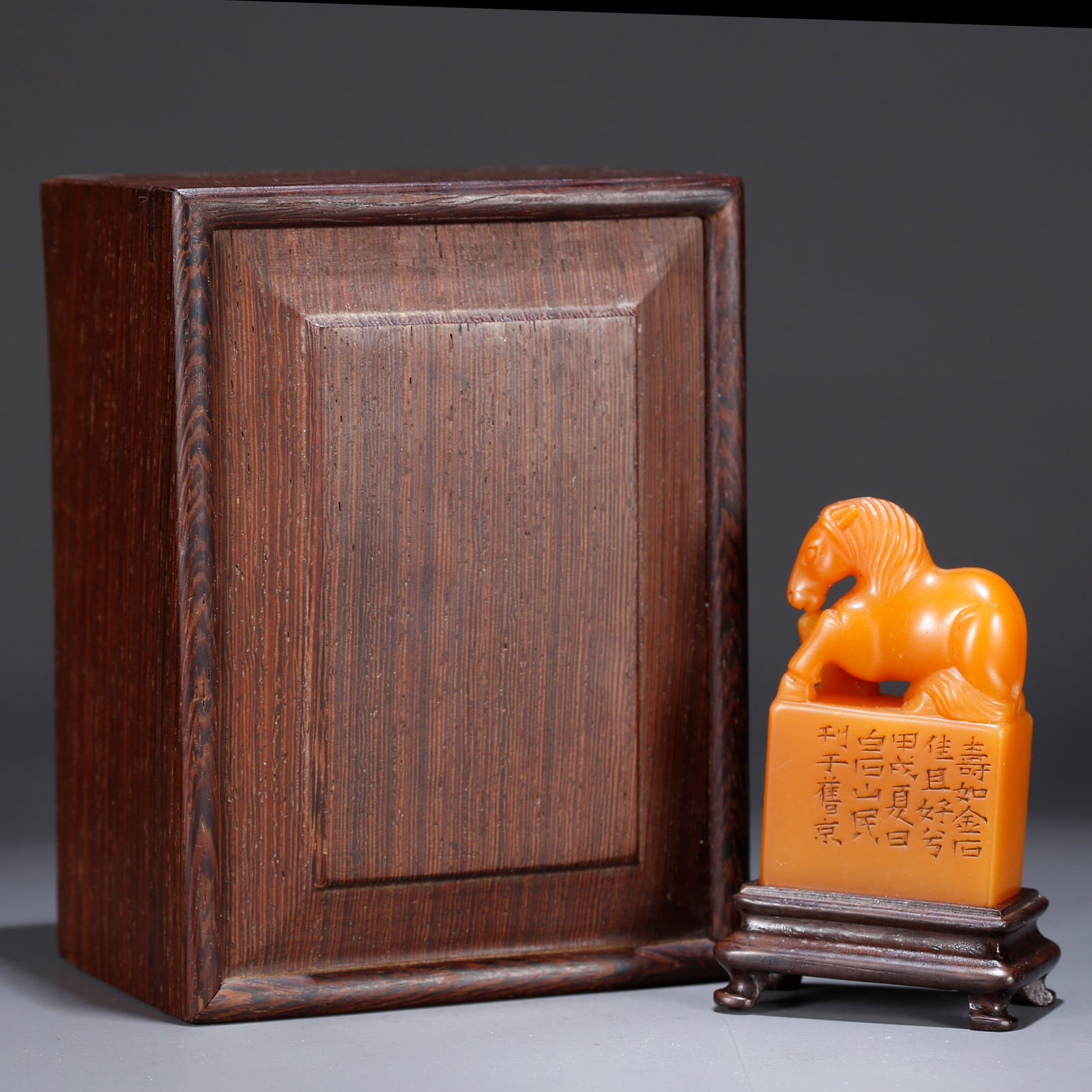 A SHOUSHAN TIANHUANG STONE SEAL WITH GALLOPING HORSE KNOB: Shoushan Tianhuang Stone Seal with Galloping Horse Knob