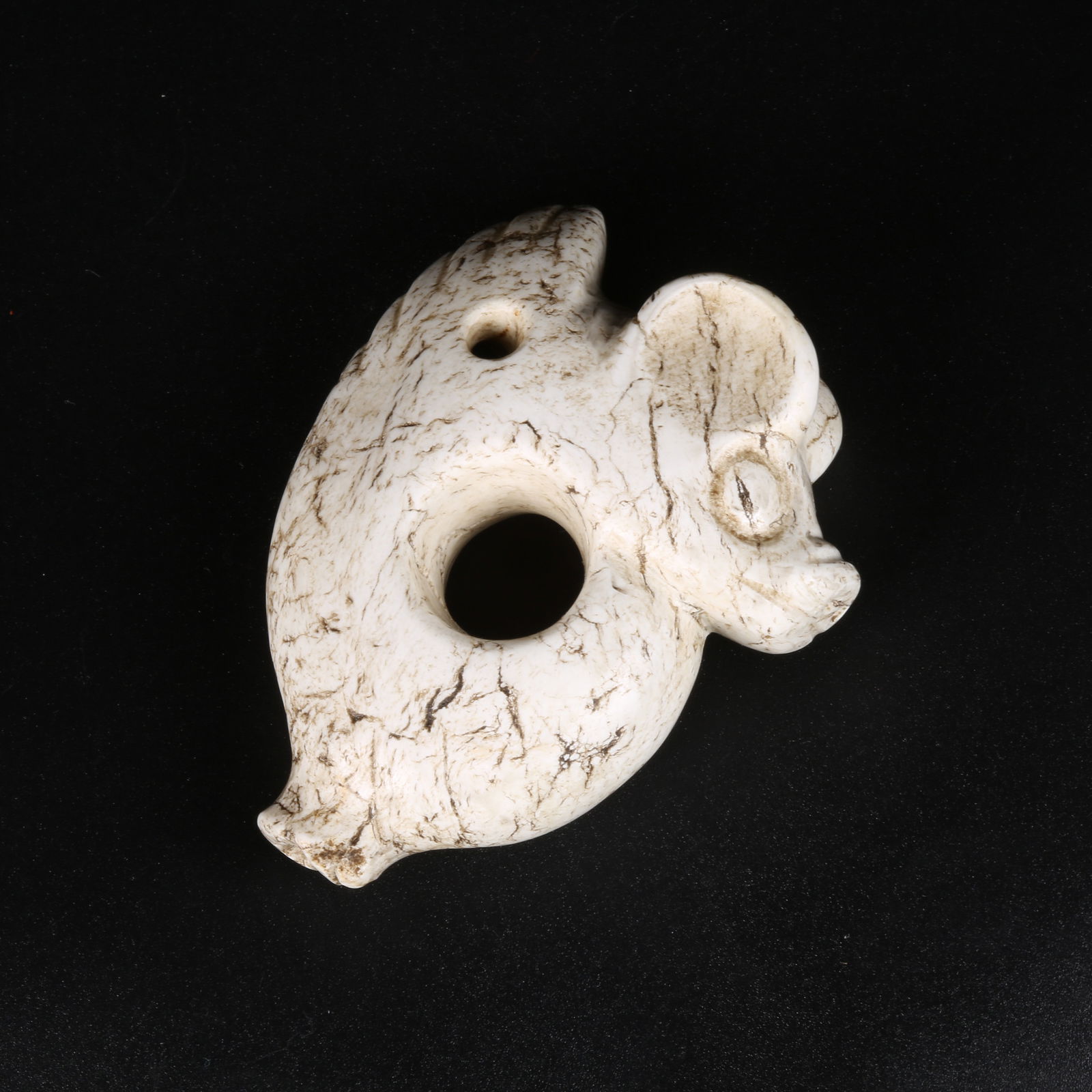 A ARCHAIC JADE C-SHAPED DRAGON PENDANT (1 of 8)