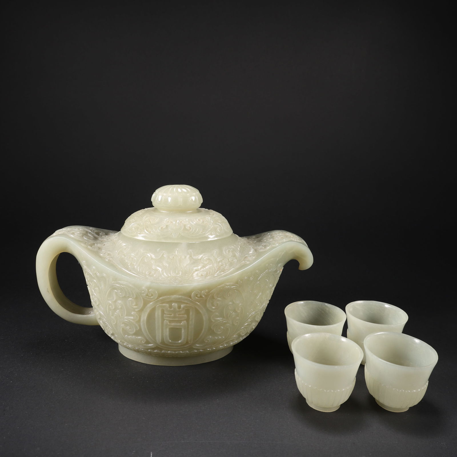 A SET OF HETIAN JADE AUSPICIOUS TEAPOTS (1 of 9)