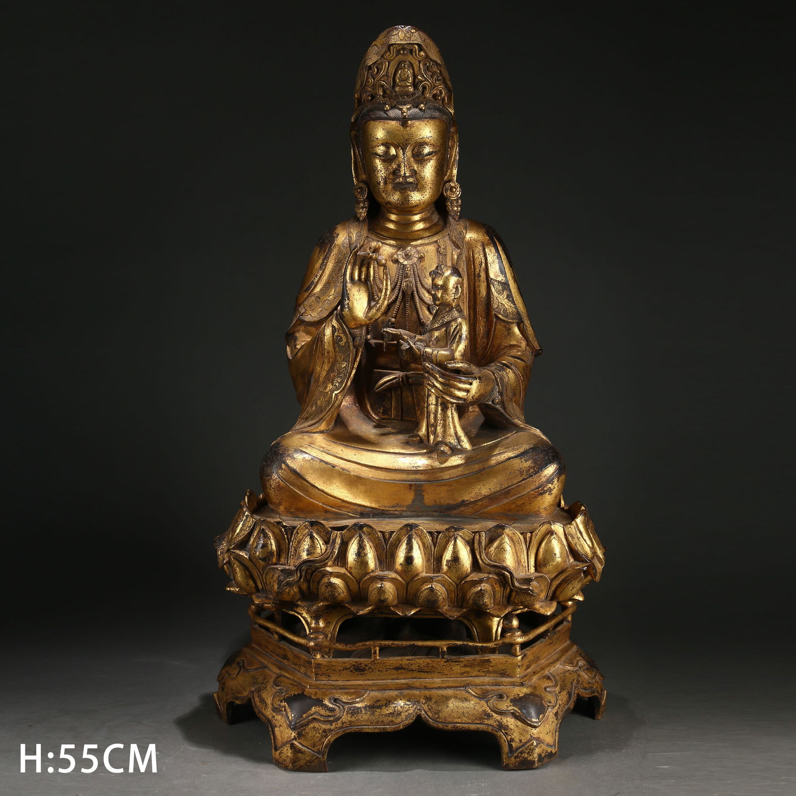 A GILT BRONZE CHILD-GIVING GUANYIN STATUE (1 of 9)