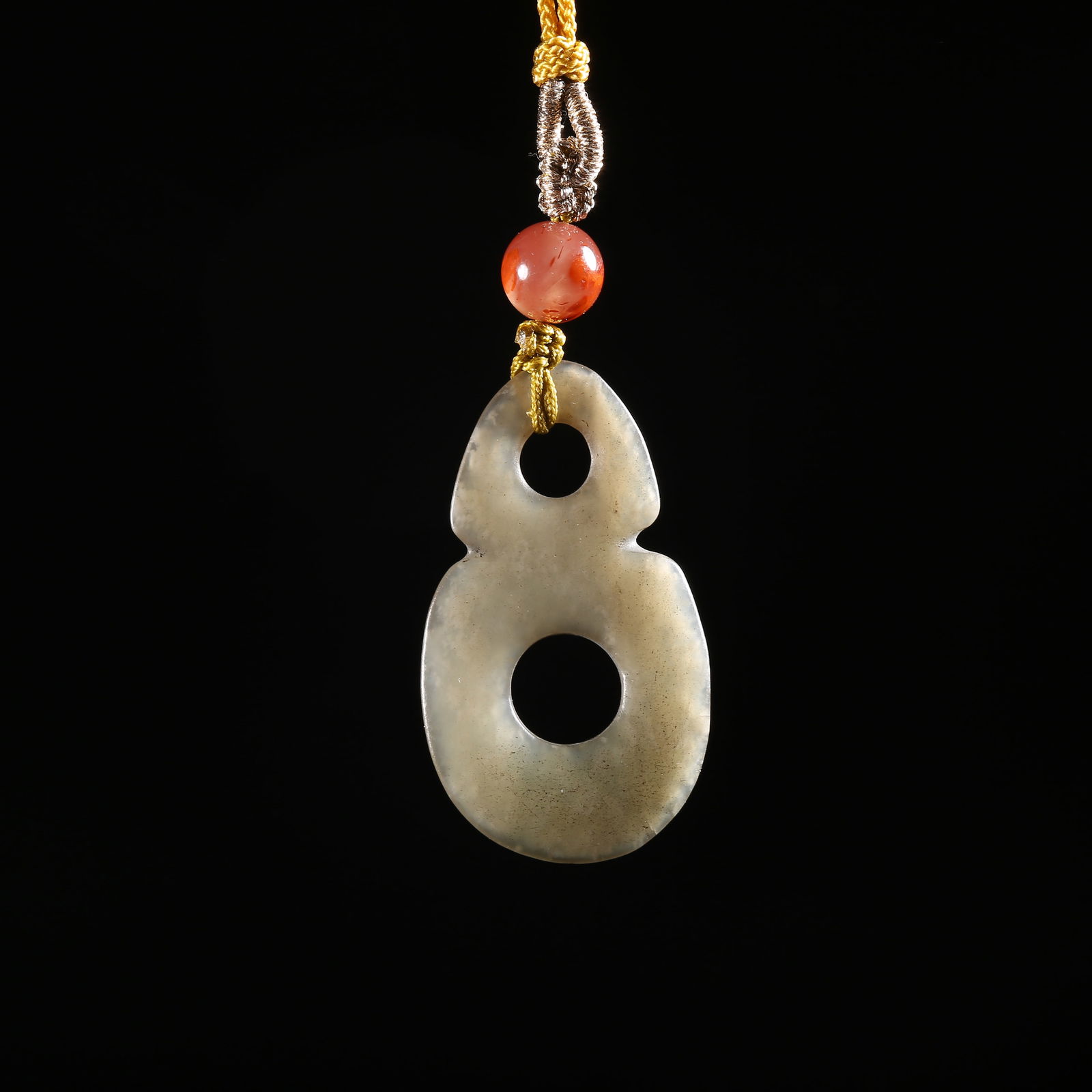 A ARCHAIC JADE GOURD-SHAPED PENDANT (1 of 7)