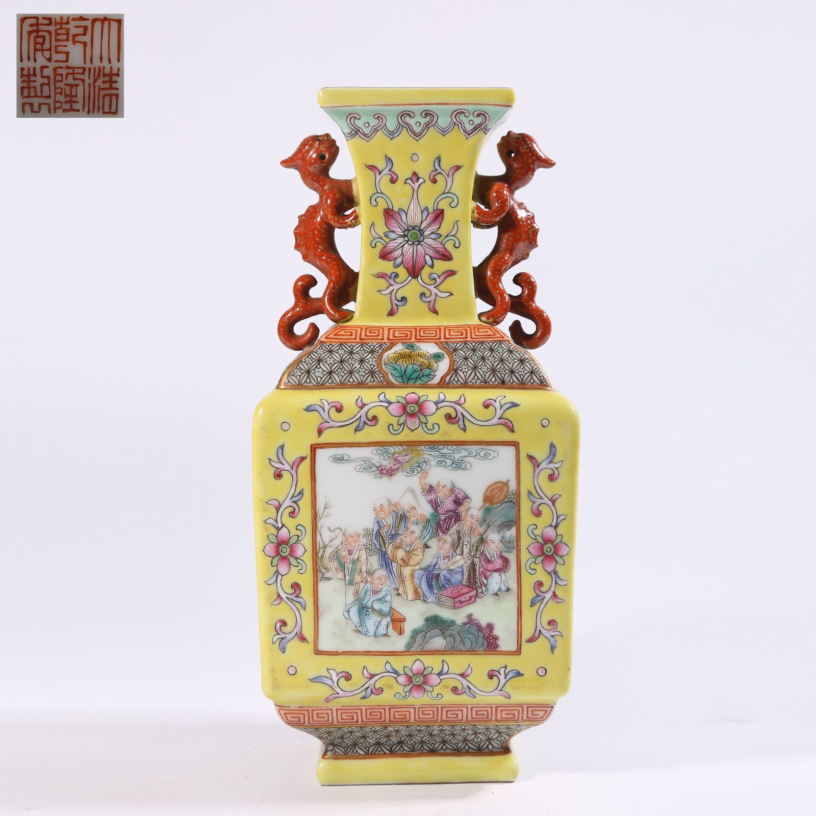 A YELLOW-GROUND OPENWORK FENCAI SQUARE VASE WITH ARHAT PATTERN AND CHI-DRAGON HANDLES: Yellow-Ground Openwork Fencai Square Vase with Arhat Pattern and Chi-Dragon Handles