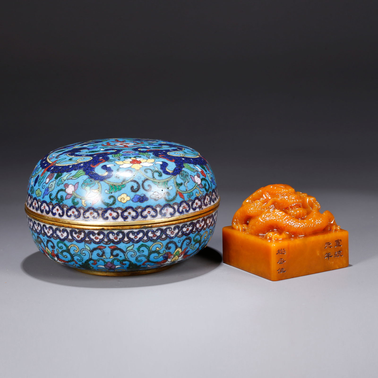 A SHOUSHAN TIANHUANG STONE CARVED CHI DRAGON KNOB SEAL: Shoushan Tianhuang stone carved chi dragon knob seal