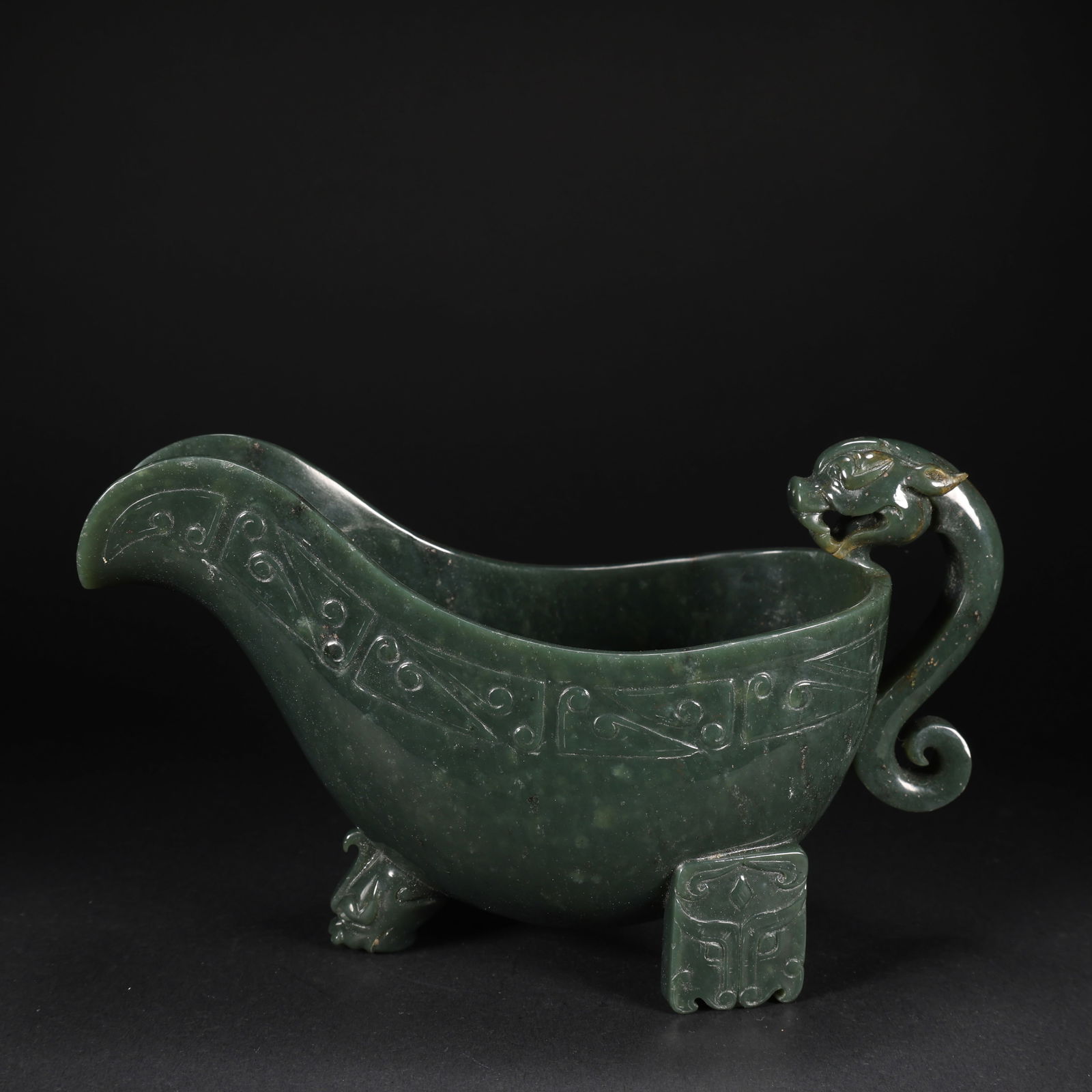 A HETIAN GREEN JADE DRAGON-HEAD HORN CUP (1 of 9)