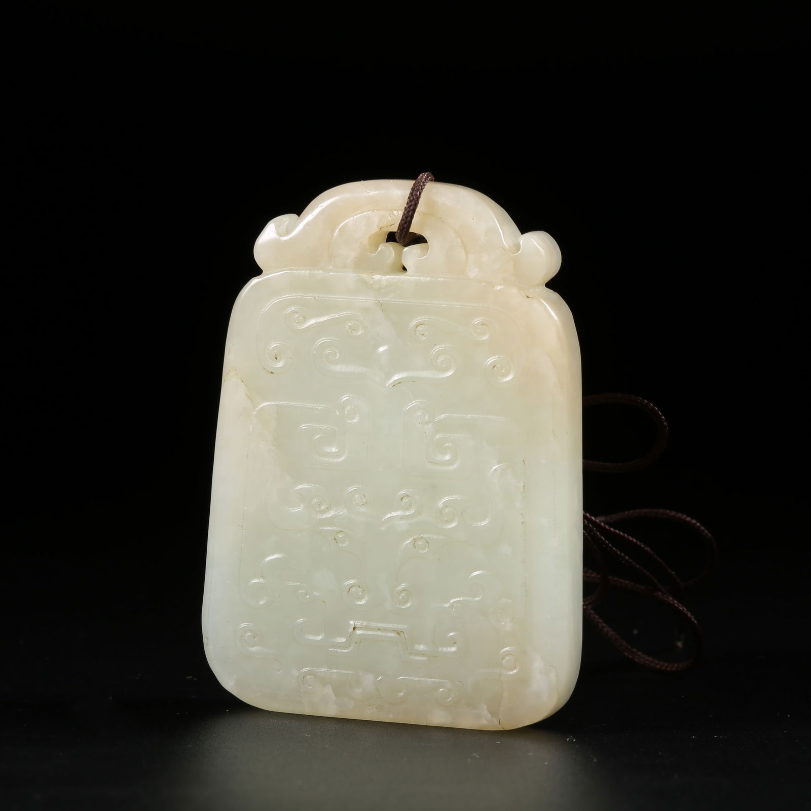 A HETIAN JADE PLAQUE WITH BEAST-FACE PATTERN: Hetian Jade Plaque with Beast-Face Pattern