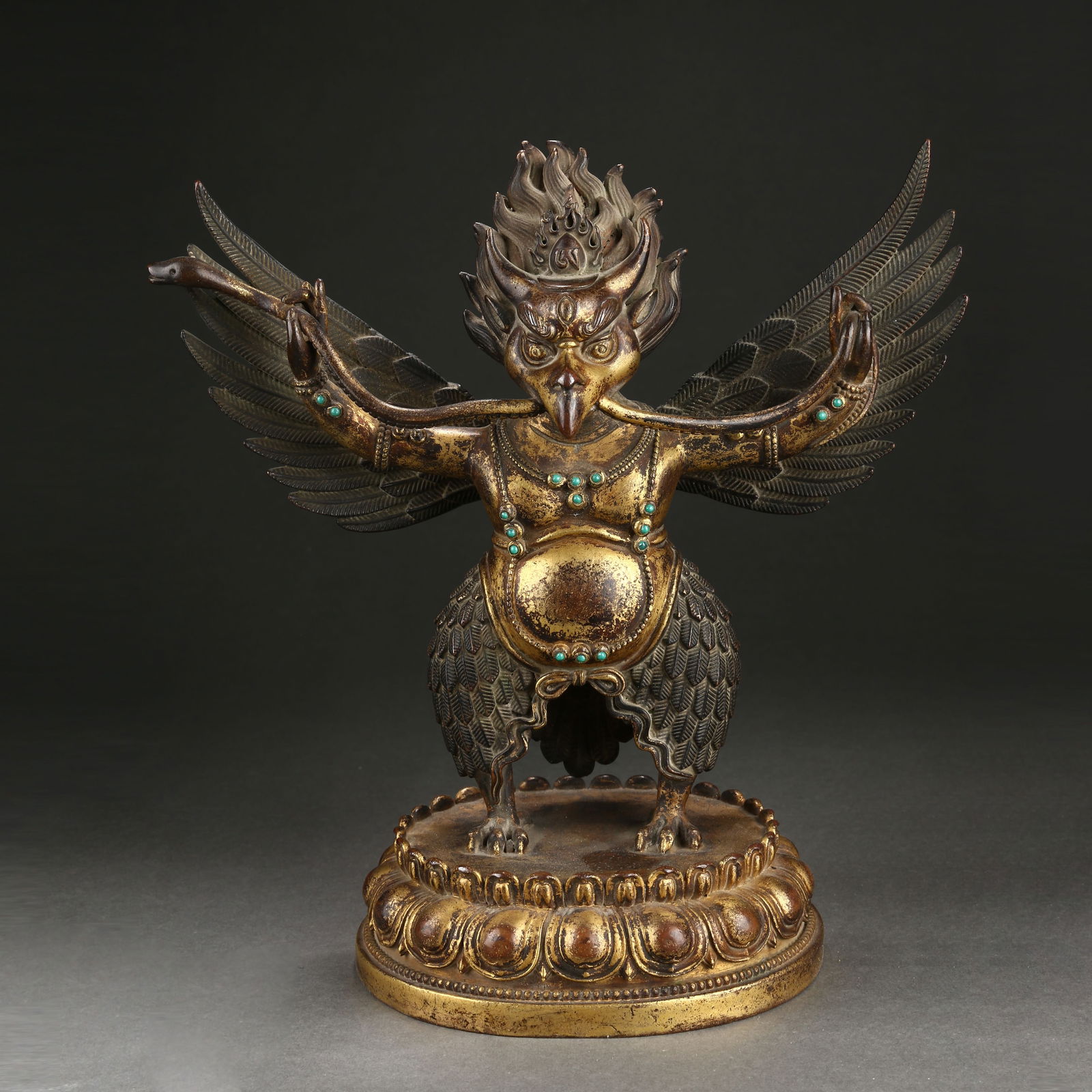 A GILT BRONZE GARUDA (GREAT BIRD) STATUE (1 of 8)