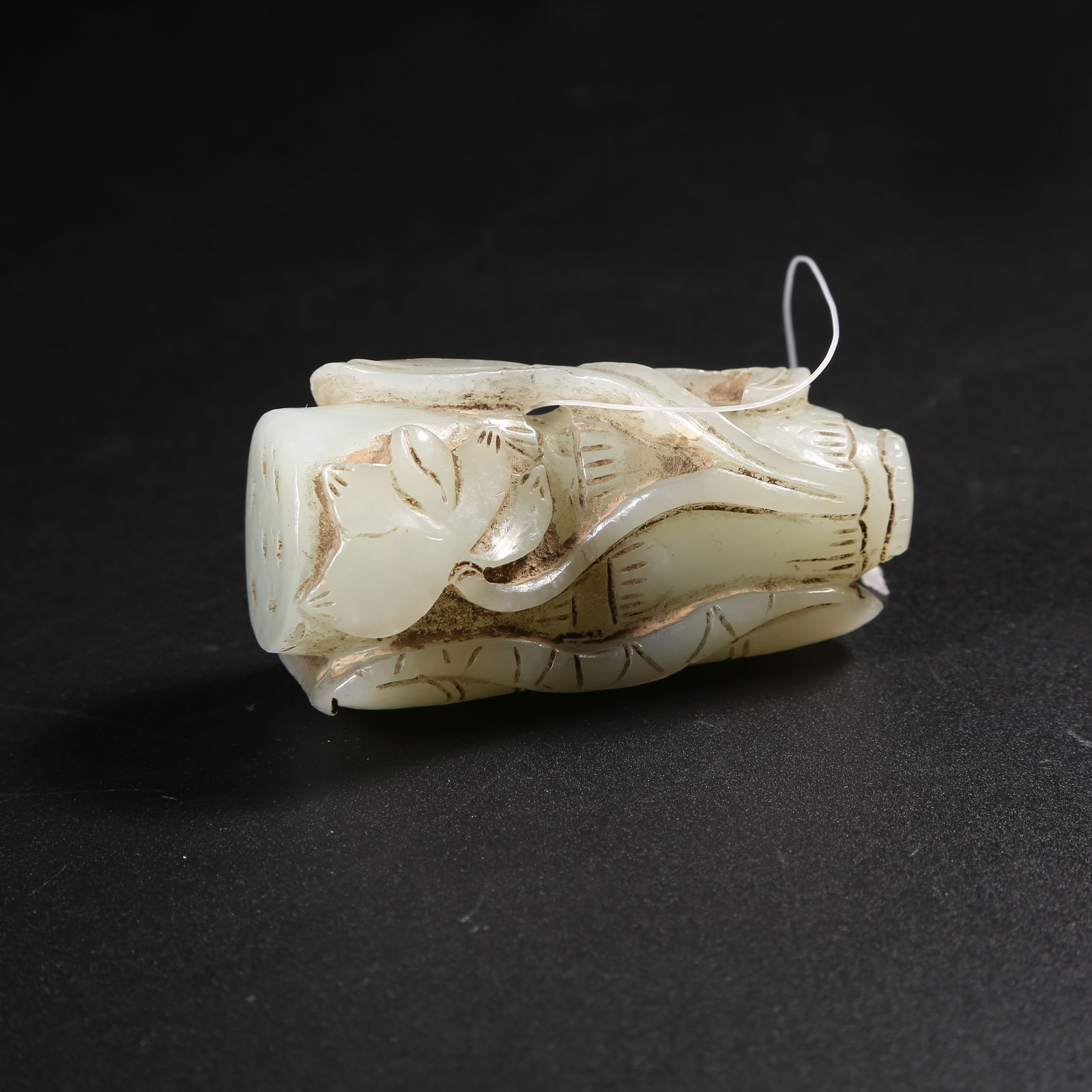 A HETIAN JADE ORNAMENT WITH BLUE LOTUS MOTIF (1 of 8)